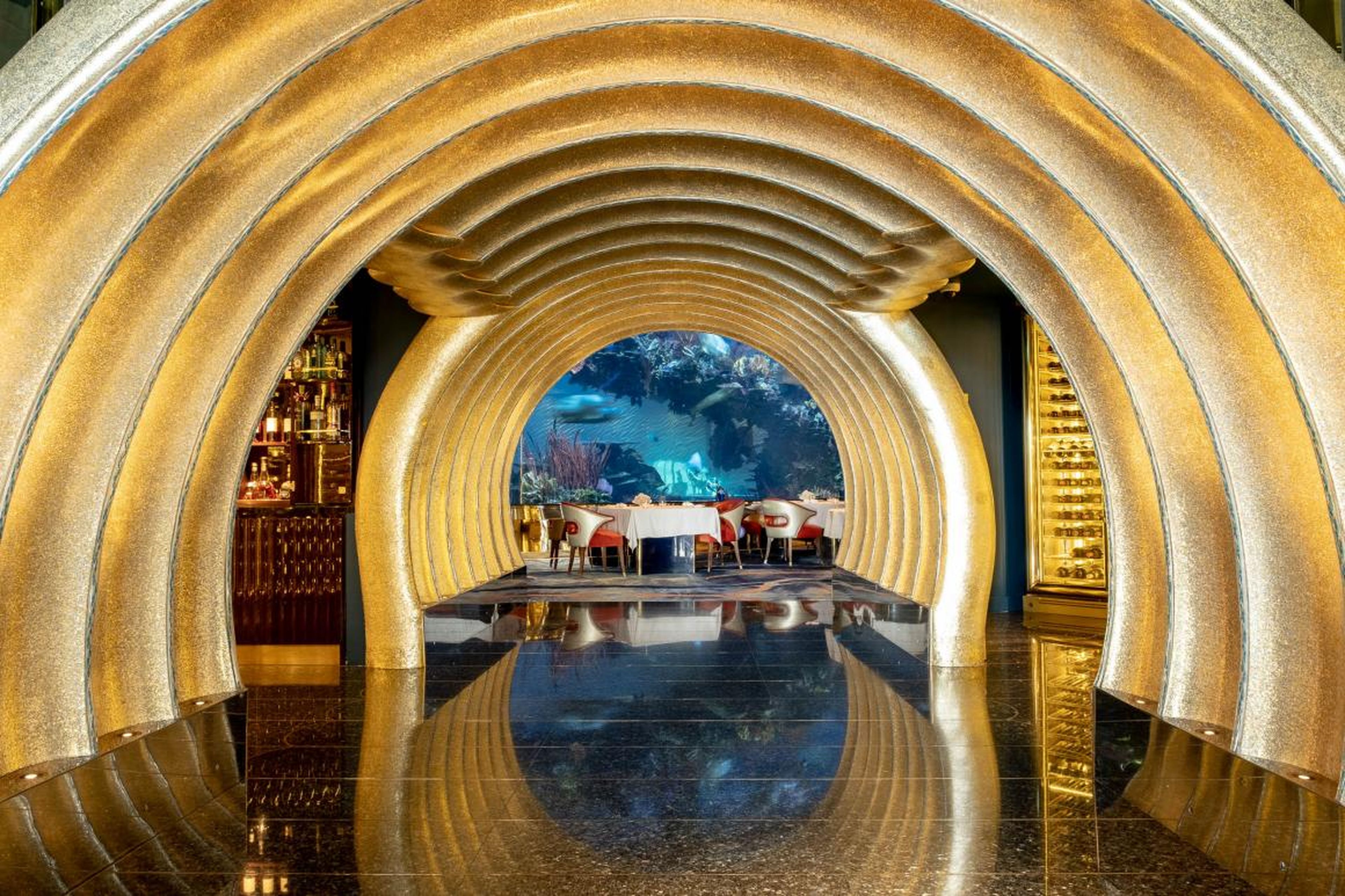 But Al Mahara, like the Burj, does nothing halfway. Witness this golden seashell entrance hallway to the dining room. There are a few places I've been to in my life that seem ripped from a Bond villain's lair. This is one of them.