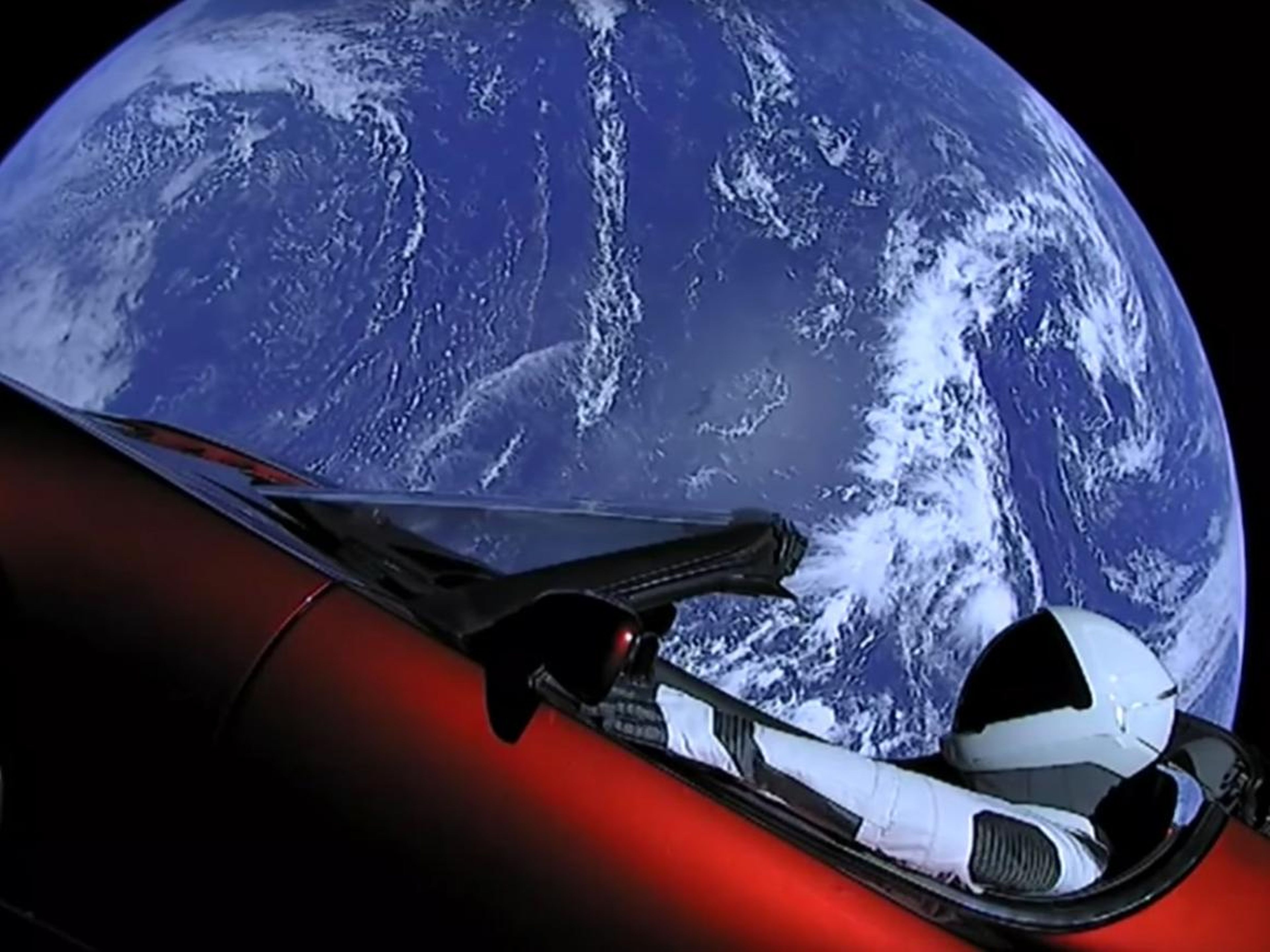 The payload on that Falcon Heavy rocket was Musk's red Tesla Roadster, complete with a dummy driver and a note on the dash: "DON'T PANIC!"