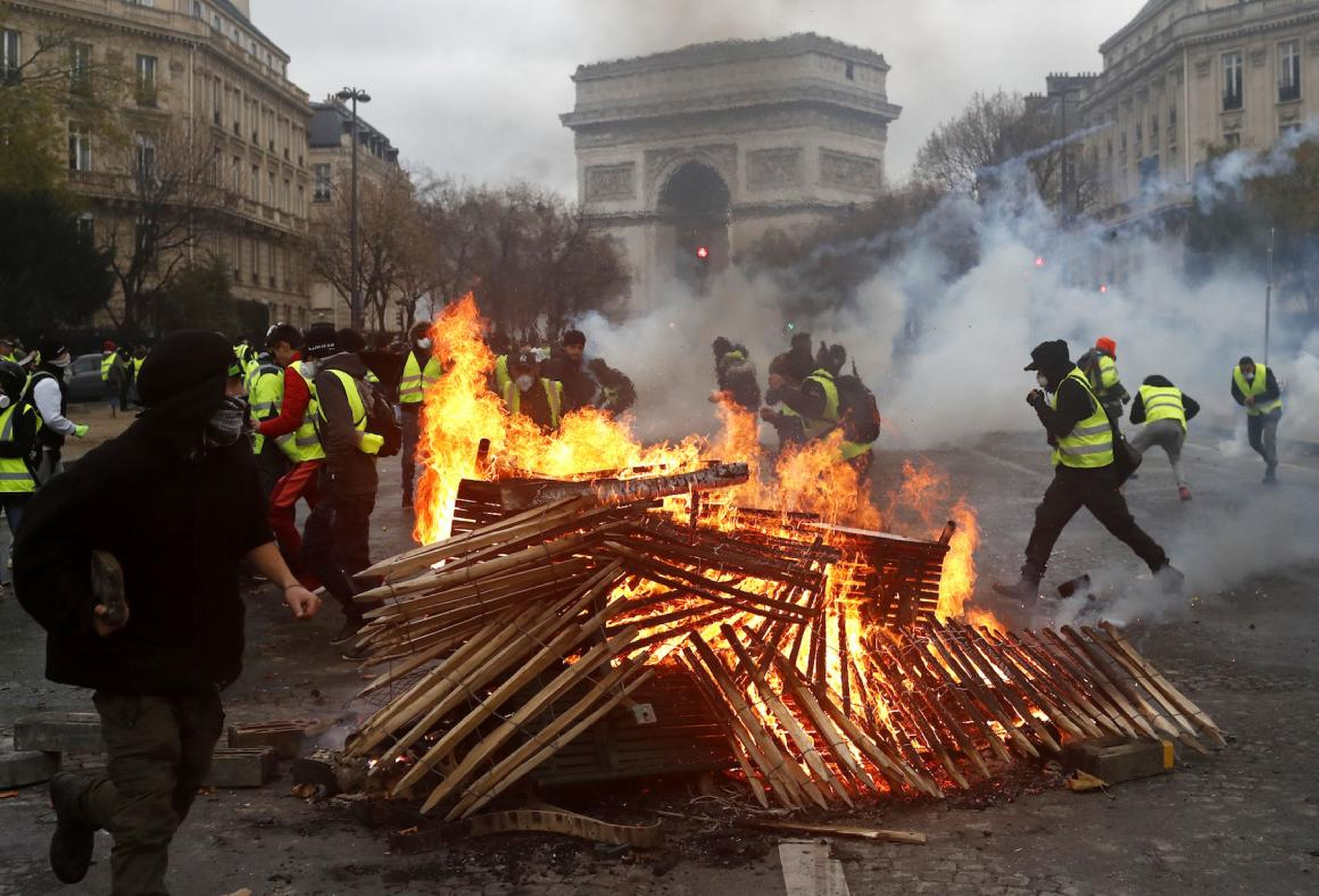 Protesters lit fires near the Arc de Triomphe.