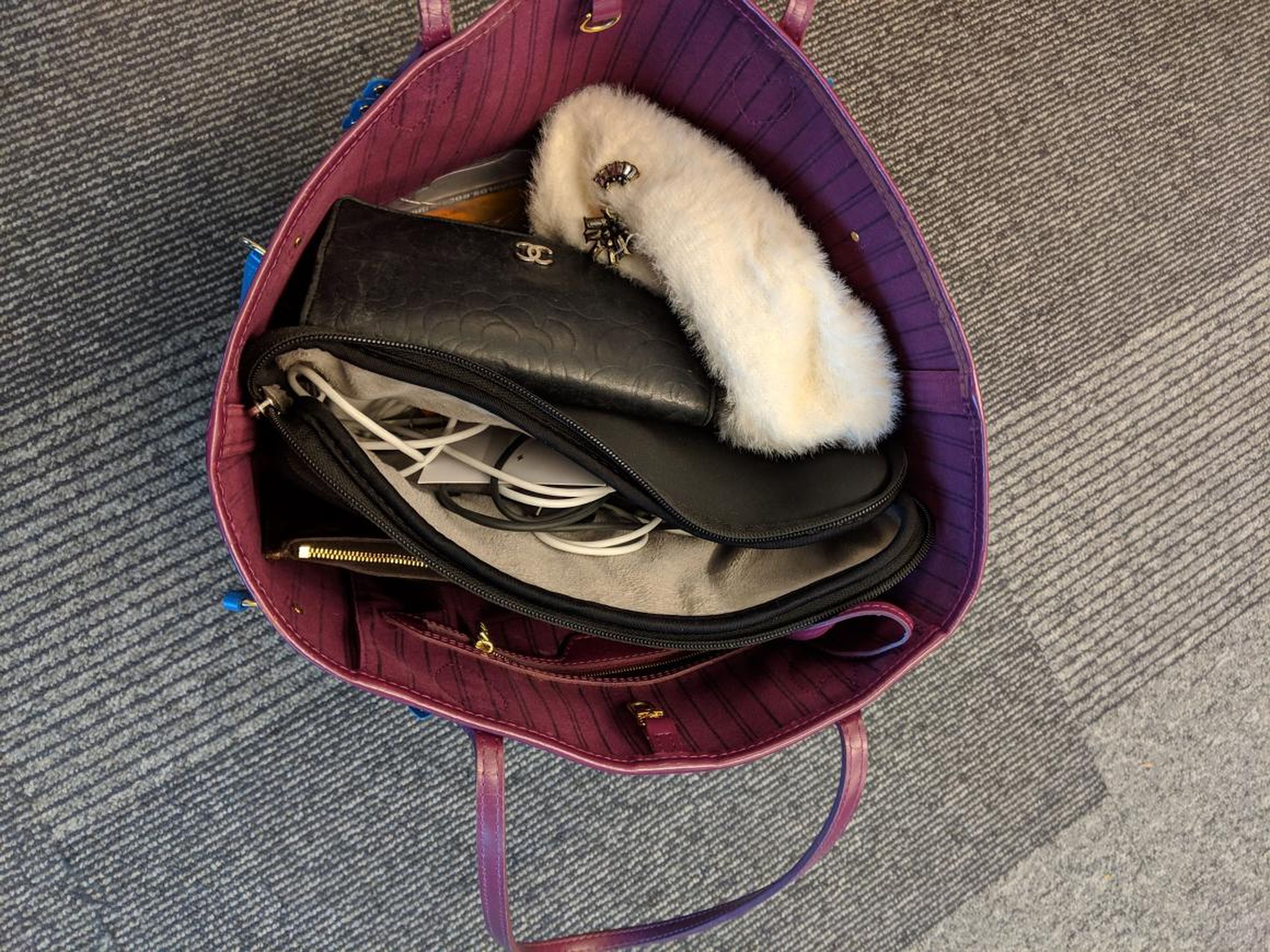 Rincon's work bag usually contains her computer, wallet, phone, a hair tie, and some lipstick. "I also throw in a fuzzy tuque (I am Canadian, after all) for when the weather gets cooler here in Mountain View," Rincon said.