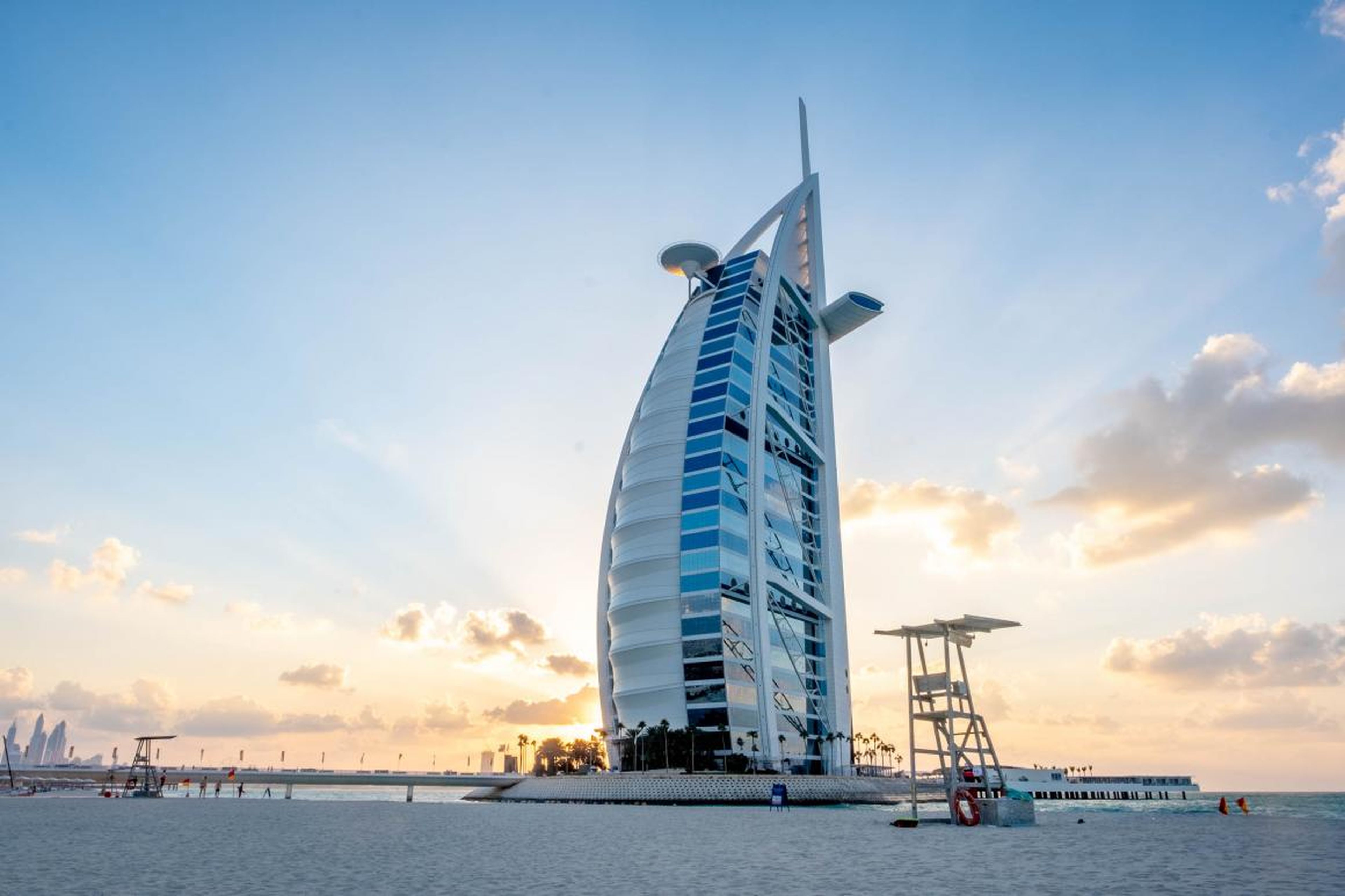 Shaped like the sail of an Arabian dhow ship and built for $1 billion, the Burj Al Arab in Dubai has been described as the world's first seven-star hotel and the most luxurious hotel in the world.