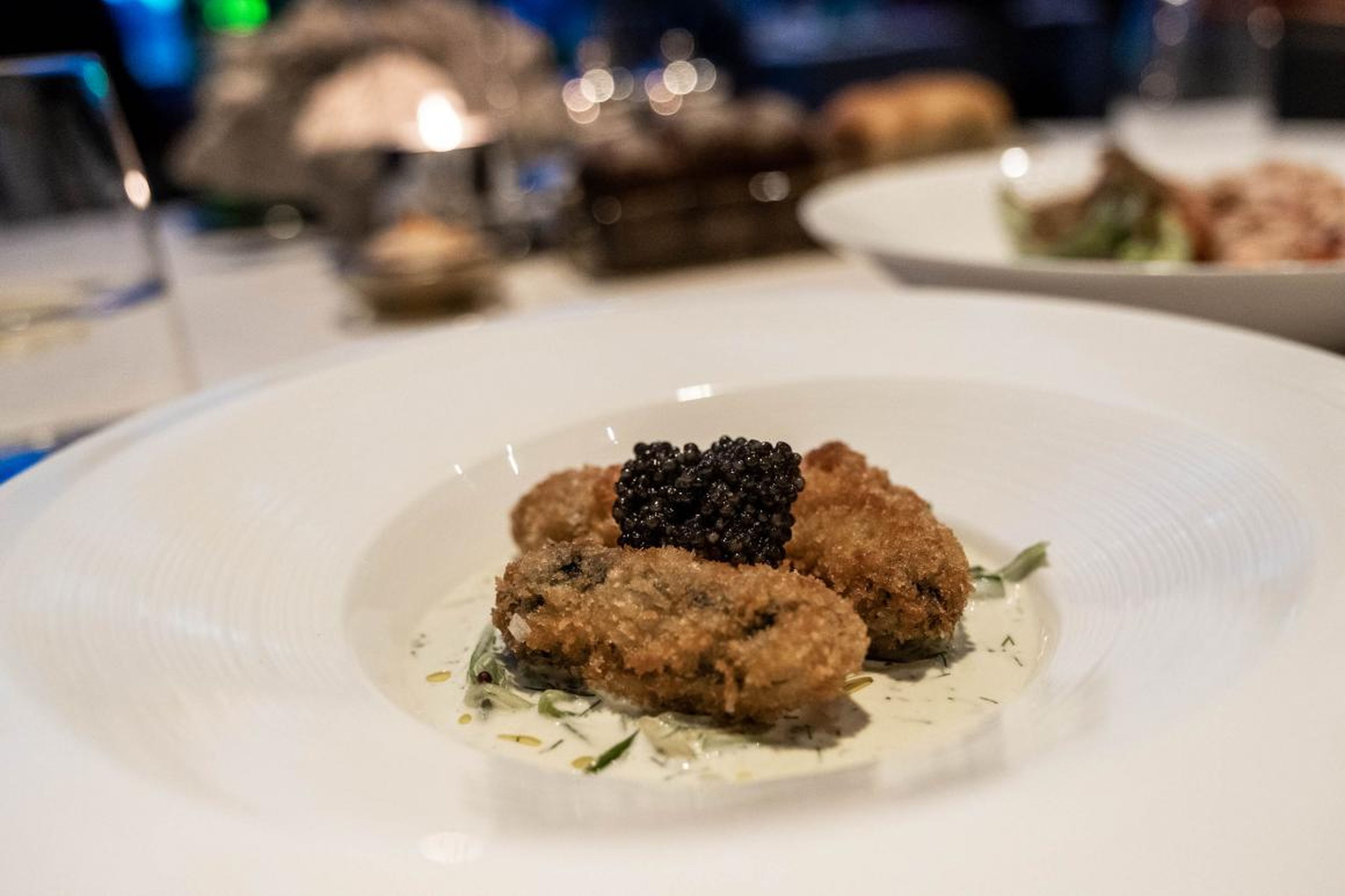 While Brunt described Outlaw's "pared-down" approach as intact at Al Mahara, the dishes I encountered, while delicious, were often as over-the-top as a golden elevator. For example, the crispy oysters (260 AED, or $70) were not