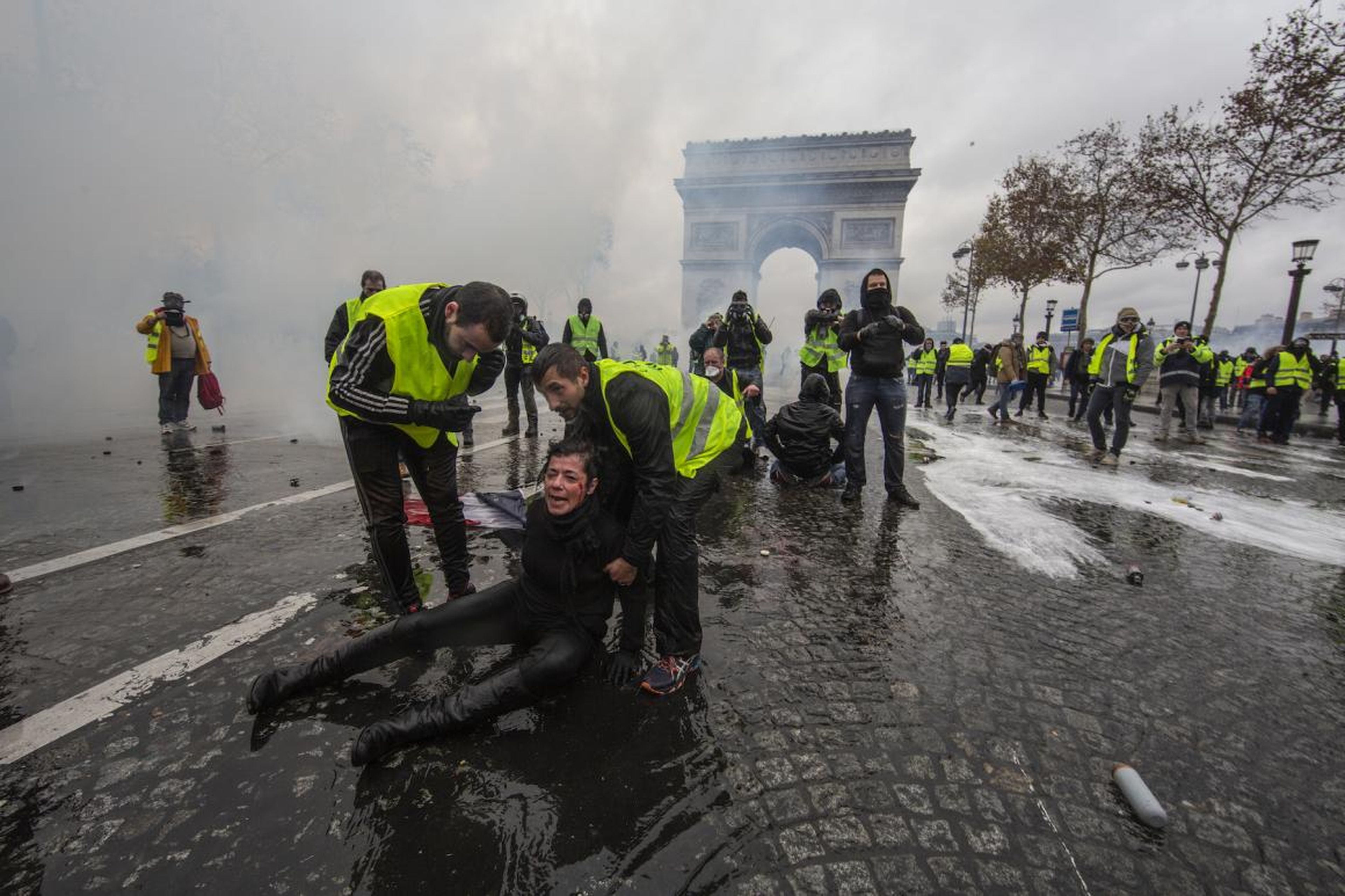 A woman was wounded by a water canon as protesters clashed with the police.