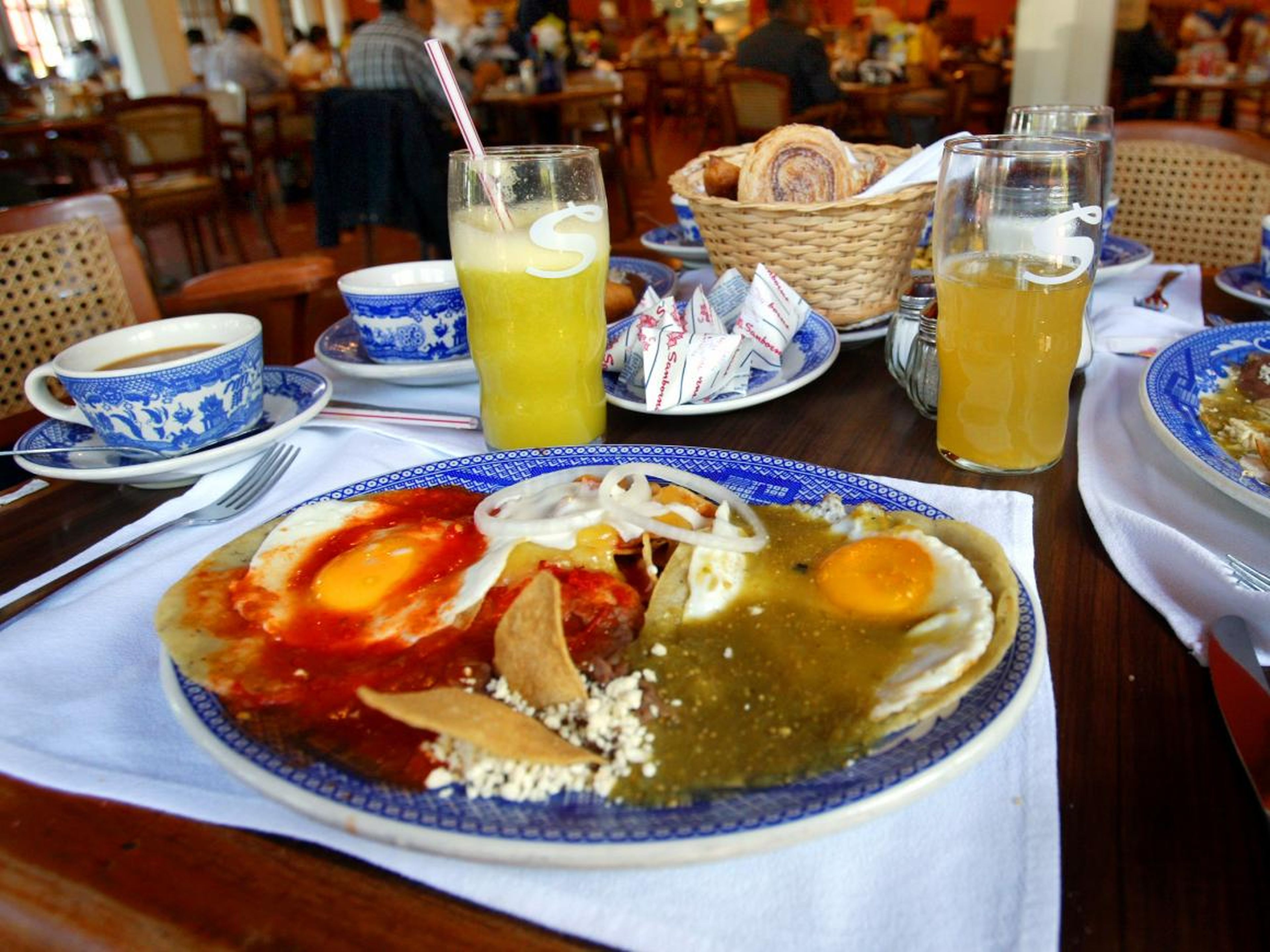 Anais is a Mexico City-born culinary tour guide and food blogger. According to this expert, one of the most popular breakfast dishes around is called chilaquiles — deep-fried tortillas soaked in a tomato- or tomatillo-based sauce,
