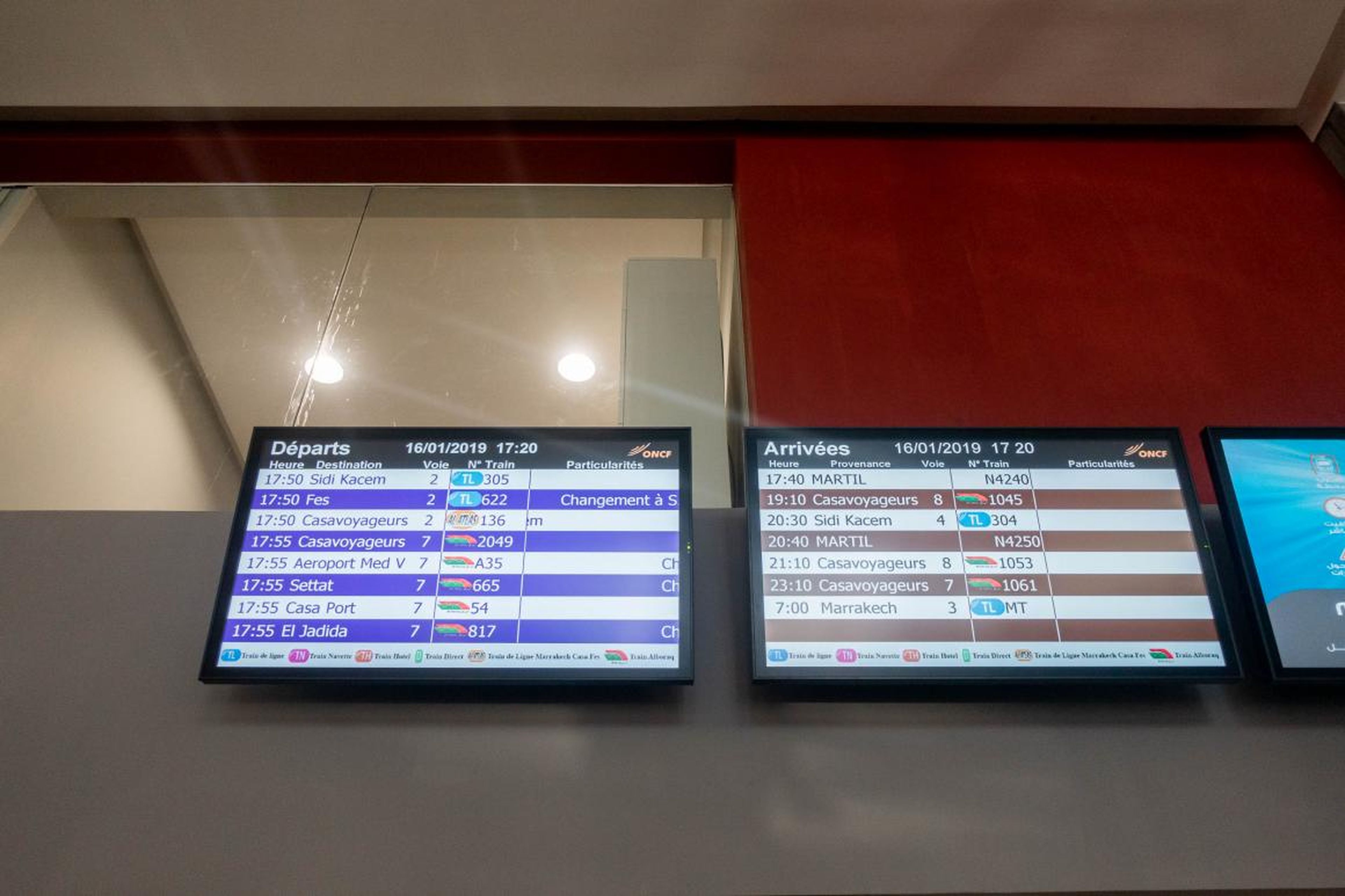 A helpful sign tells you all the train times for both regular and high-speed trains.