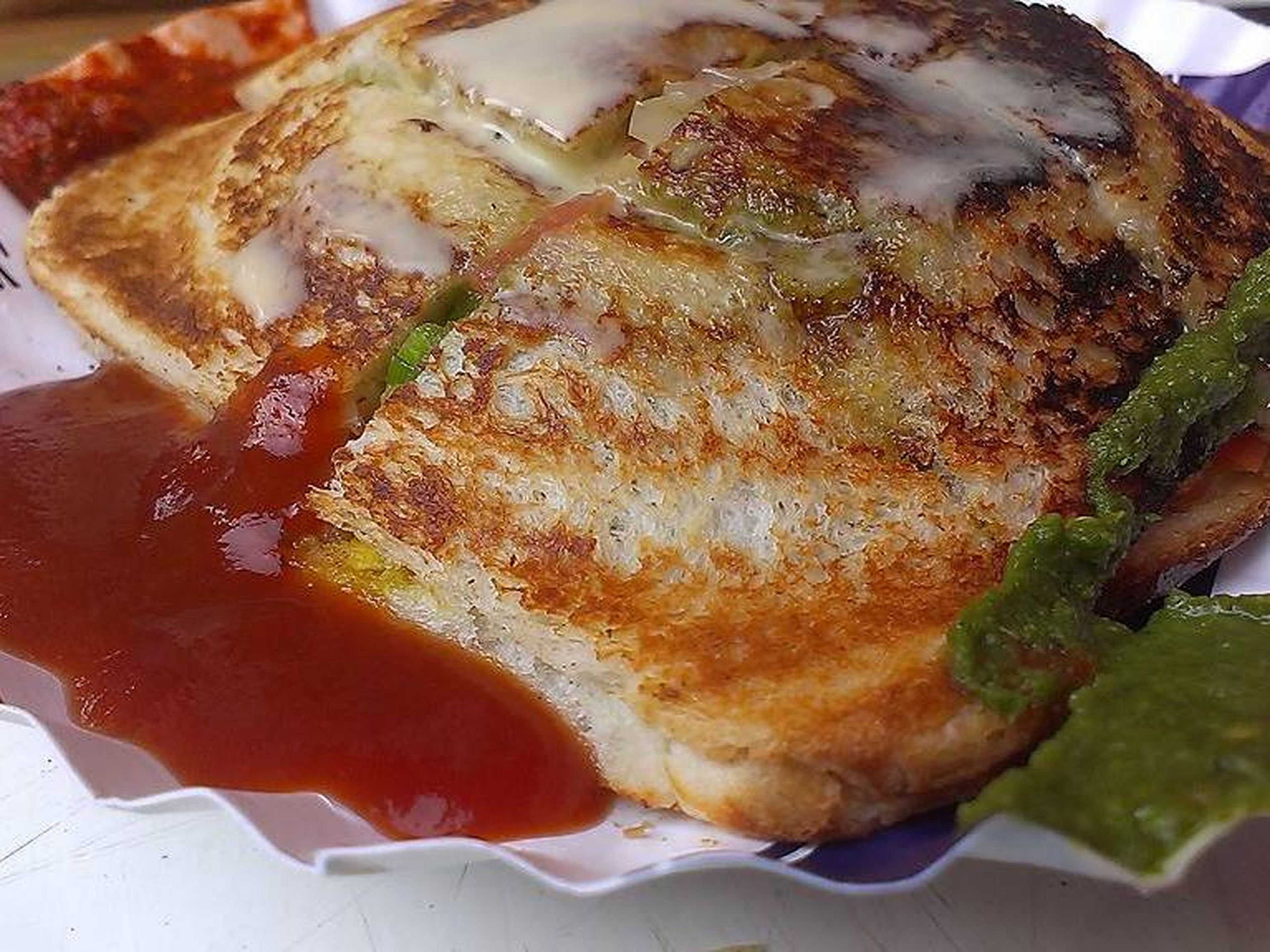 It can be served in four triangles, which Shah says helps keep the layers from spilling out the sides. "Toast and grill sandwiches have the most refreshing tangy taste after each bite," she says. "It's affordable and a must-have