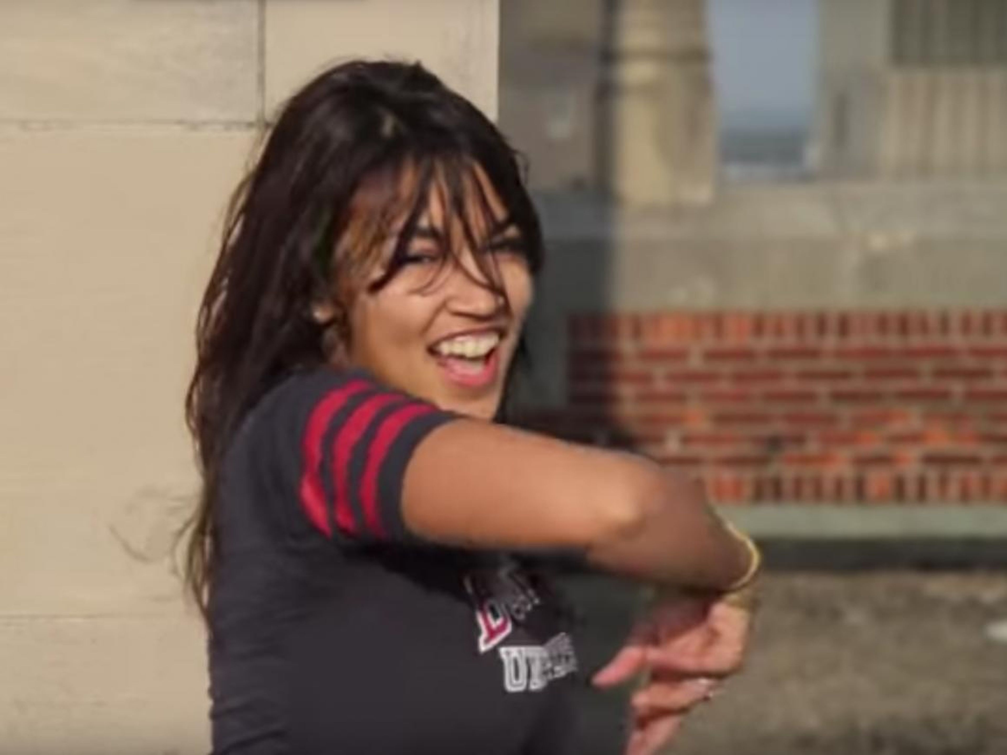 A still from the video of Alexandria Ocasio-Cortez dancing in college.
