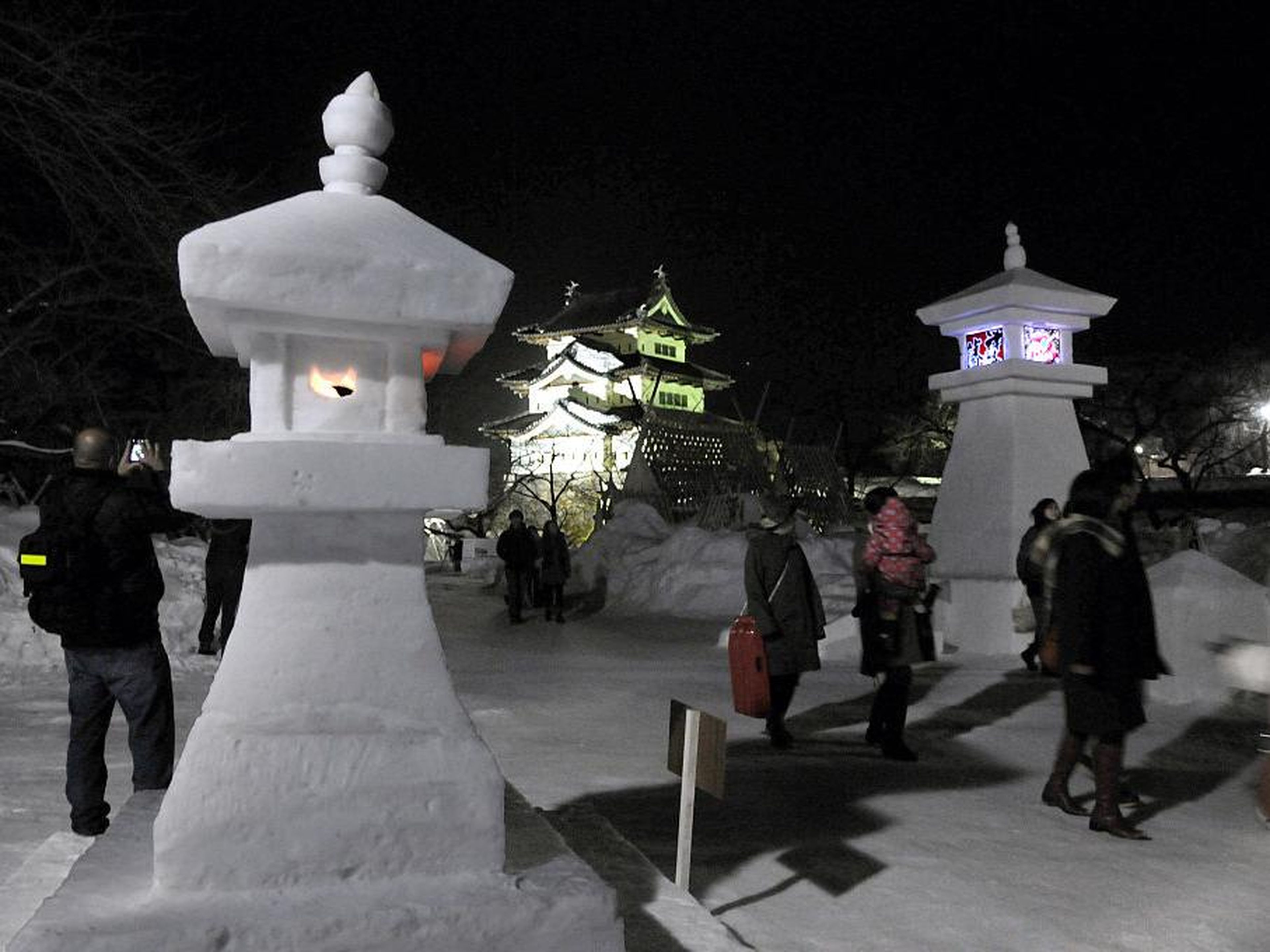 There's even the Hirosaki Castle Yuki-Doro Festival, which brings people to the castle to walk through a display of lights and lanterns made out of snow.