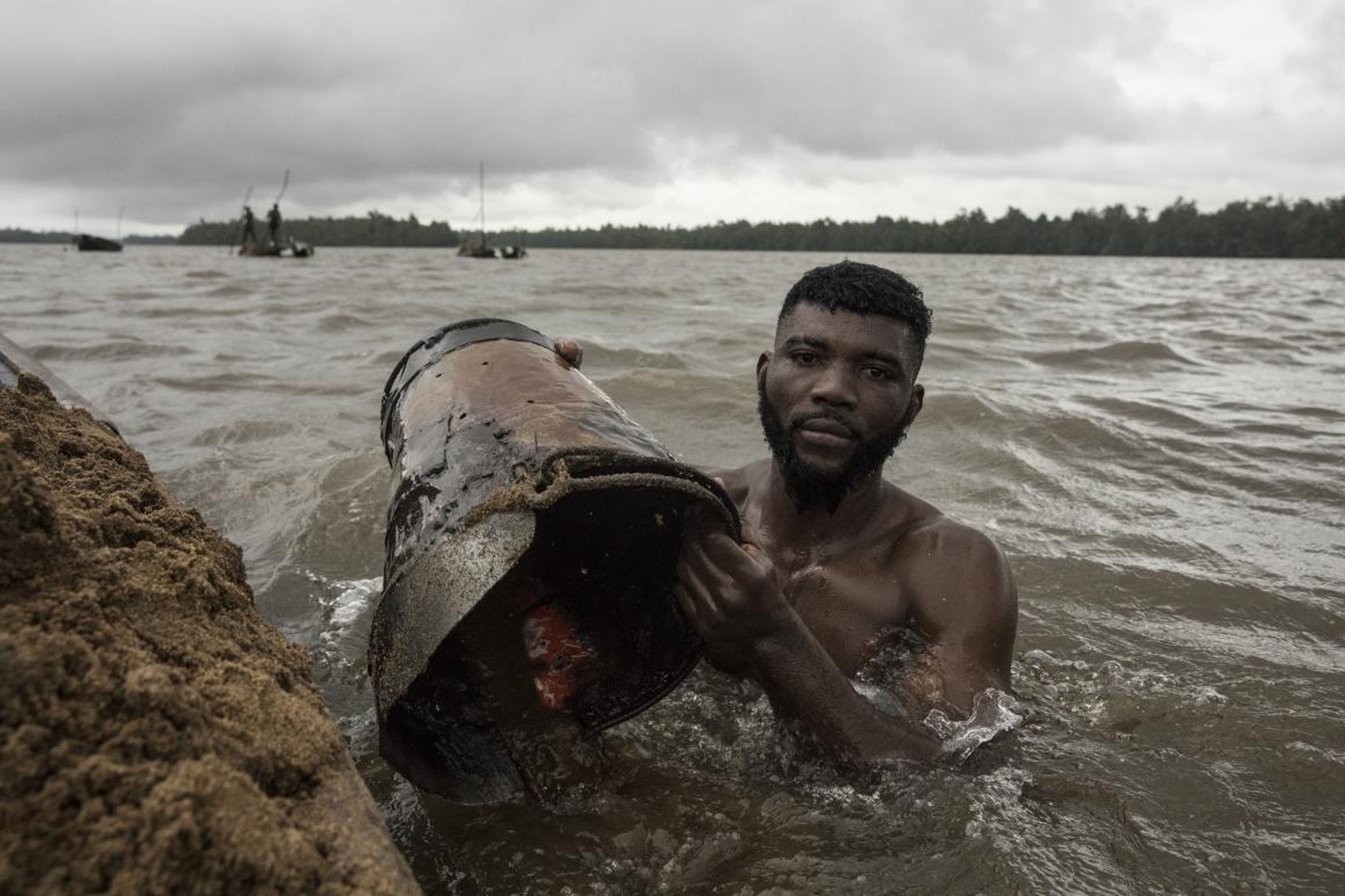 6. Sand divers in Cameroon retrieve around 1.7 tonnes of sand each in a roughly three-hour shift. "The work was brutal and dangerous and the miners dived around the low tide." Deaths occurred during Brown's time there in 2017,