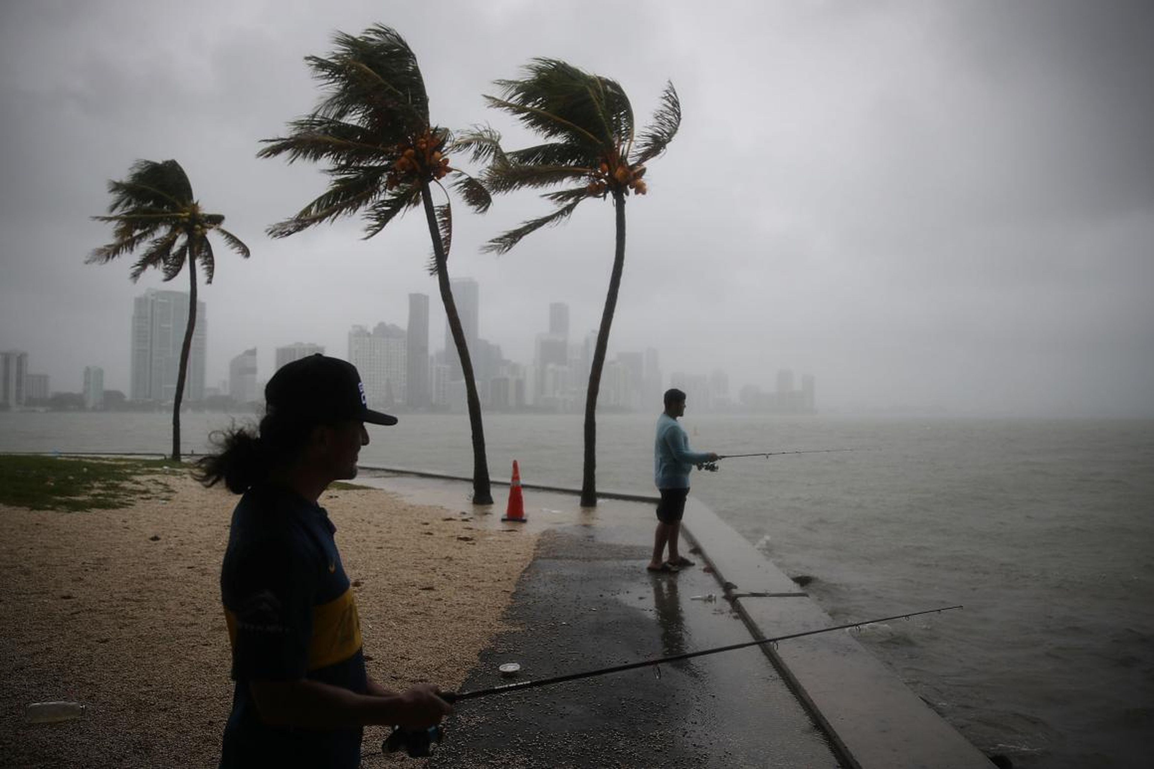 Miami residents fish during Tropical Storm Gordon on September 3, 2018.