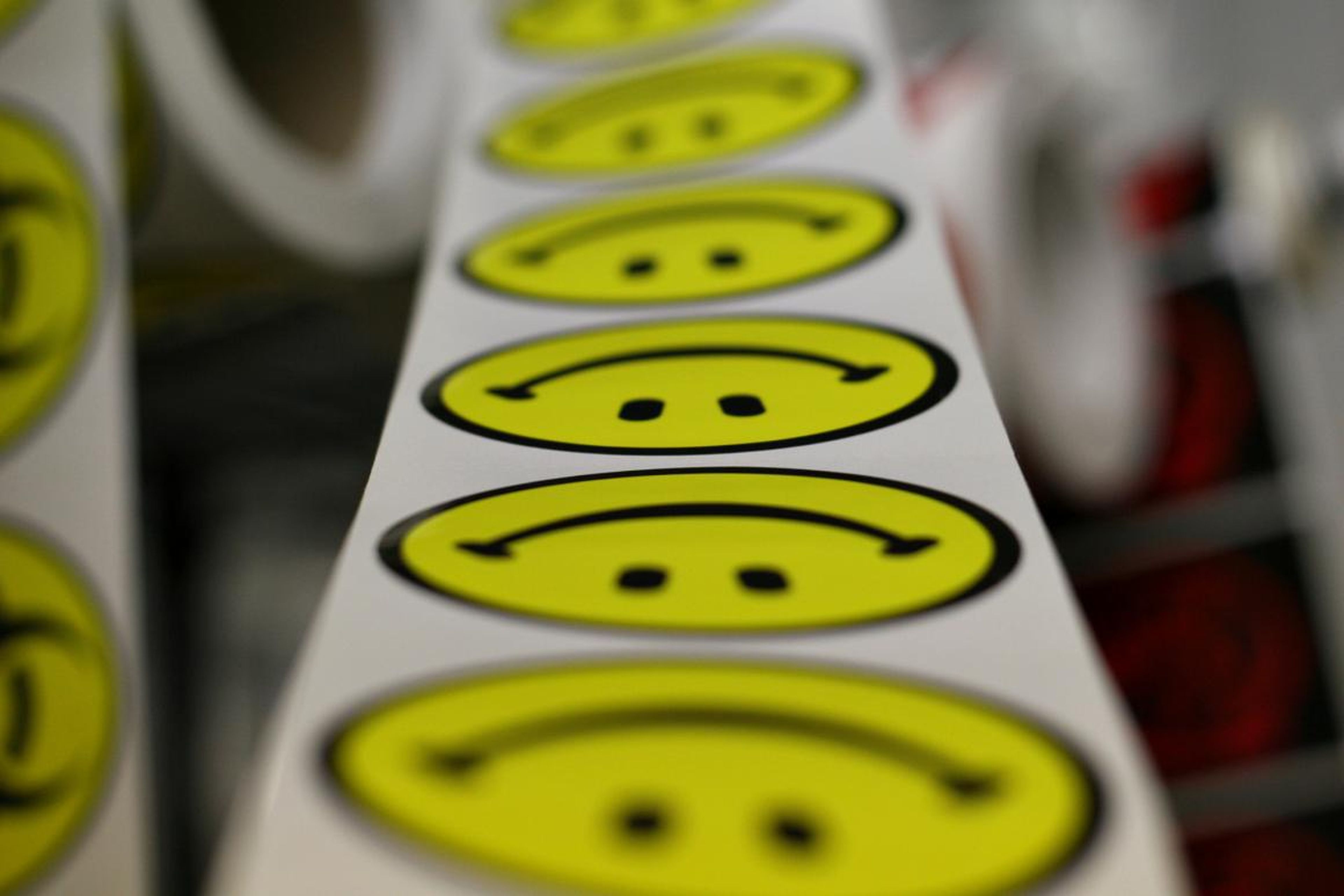 In 1963, Harvey Ball drew a smiley face outlined with a circle and filled with yellow for $45 to liven up buttons and badges. He never trademarked the design, though. Today, SmileyWorld owns the design and makes over $250 million
