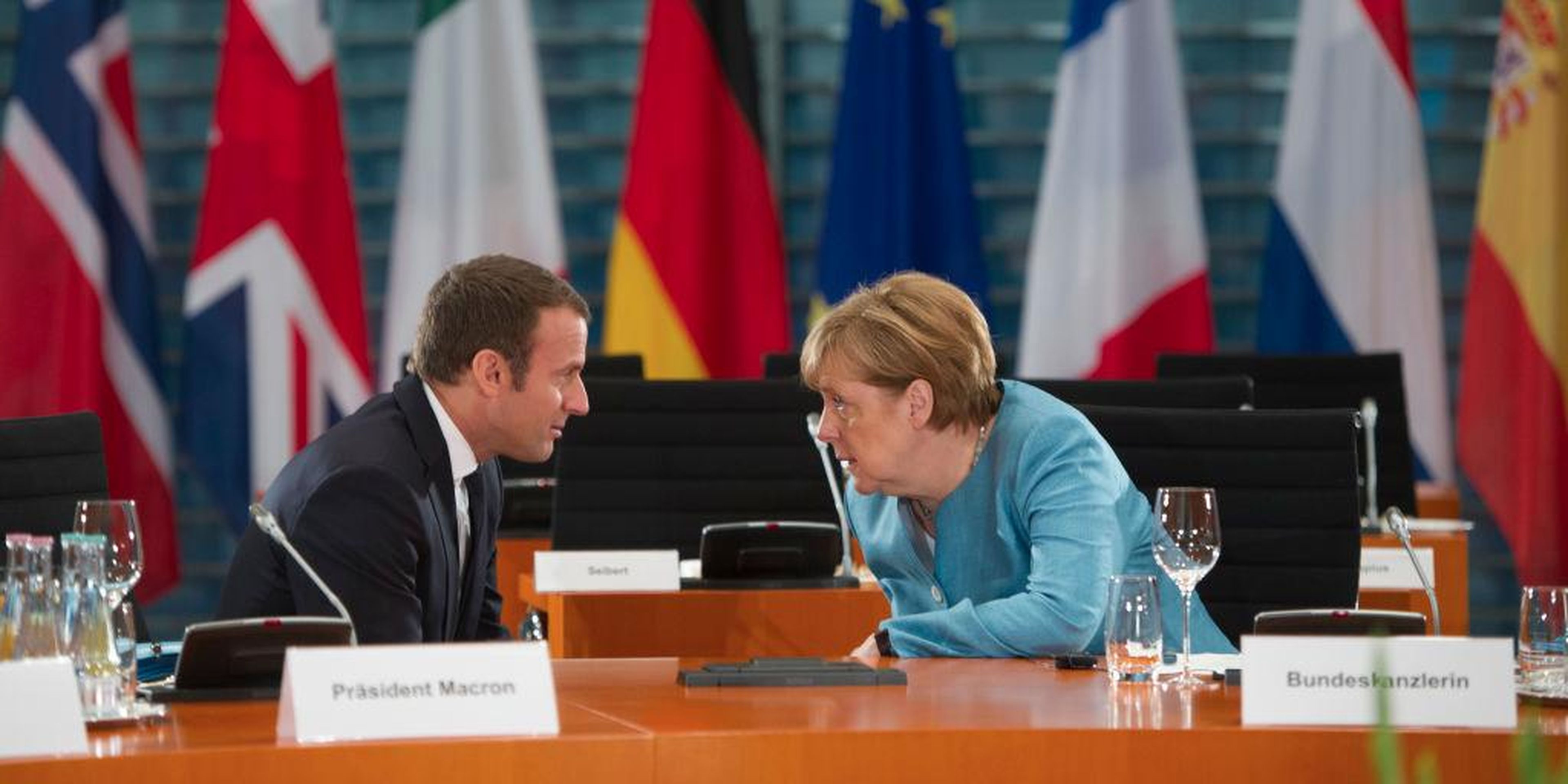 German Chancellor Angela Merkel and French President Emmanuel Macron at a meeting for EU leaders in Berlin i June 2017. Germany and France have been concerned with China's economic policies with the EU.