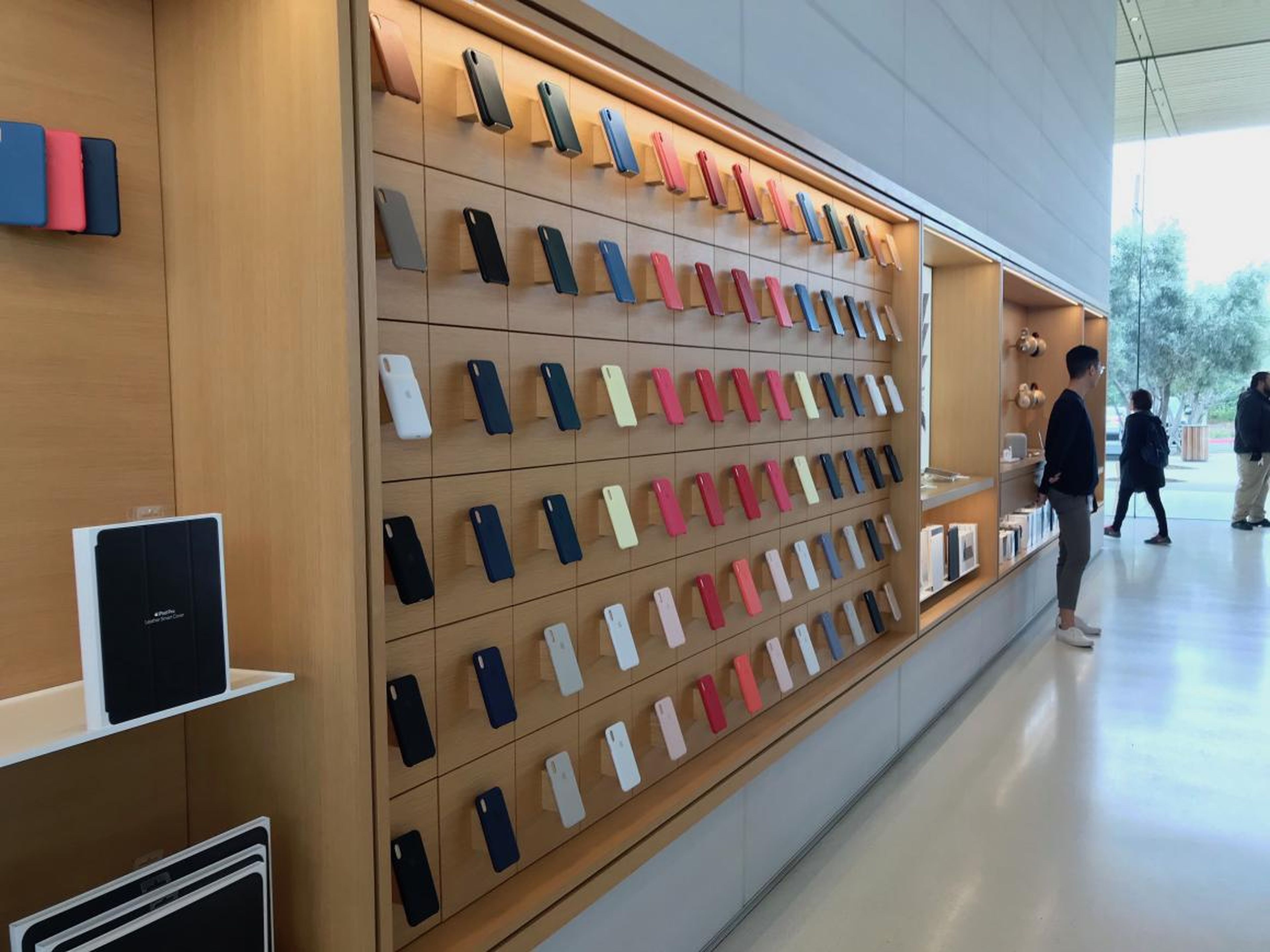 iPhone cases on display at the Apple Park Visitor Center store.