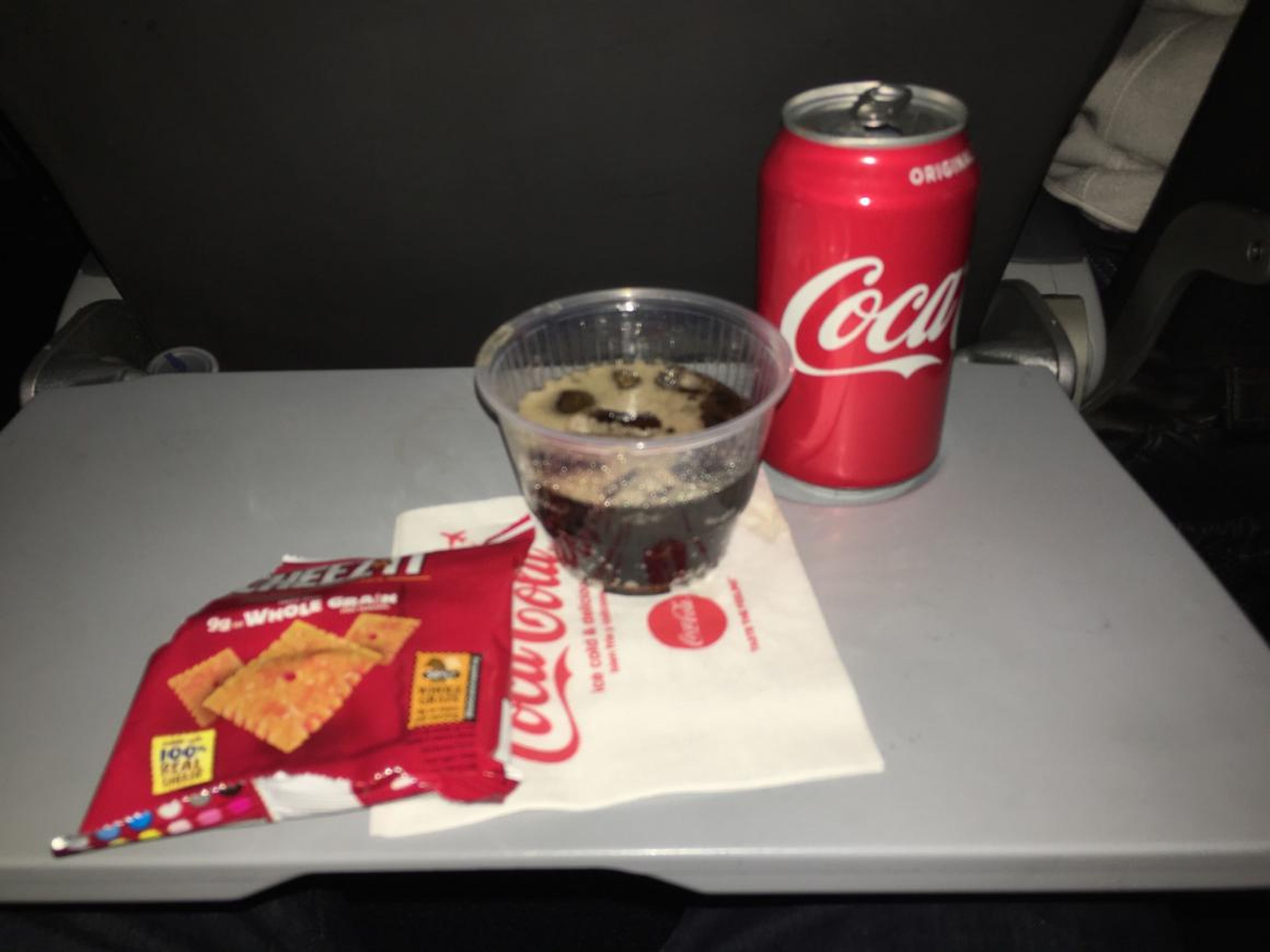 For the most part, in-flight dining in economy class means a soda and a snack.