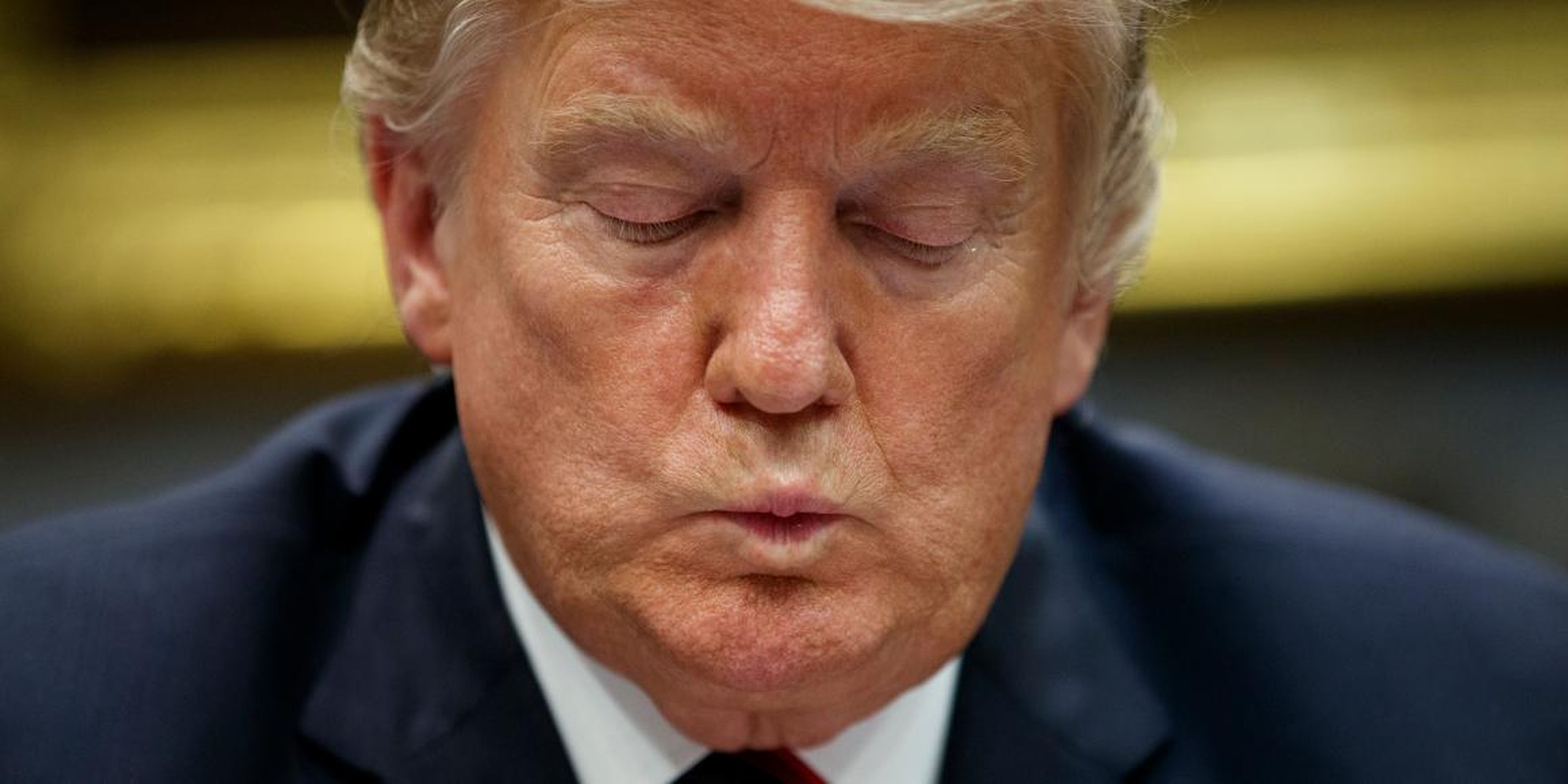 President Donald Trump listens during a briefing on drug trafficking at the southern border in the Roosevelt Room of the White House, Wednesday, March 13, 2019, in Washington. Trump said during the event the U.S. is issuing an