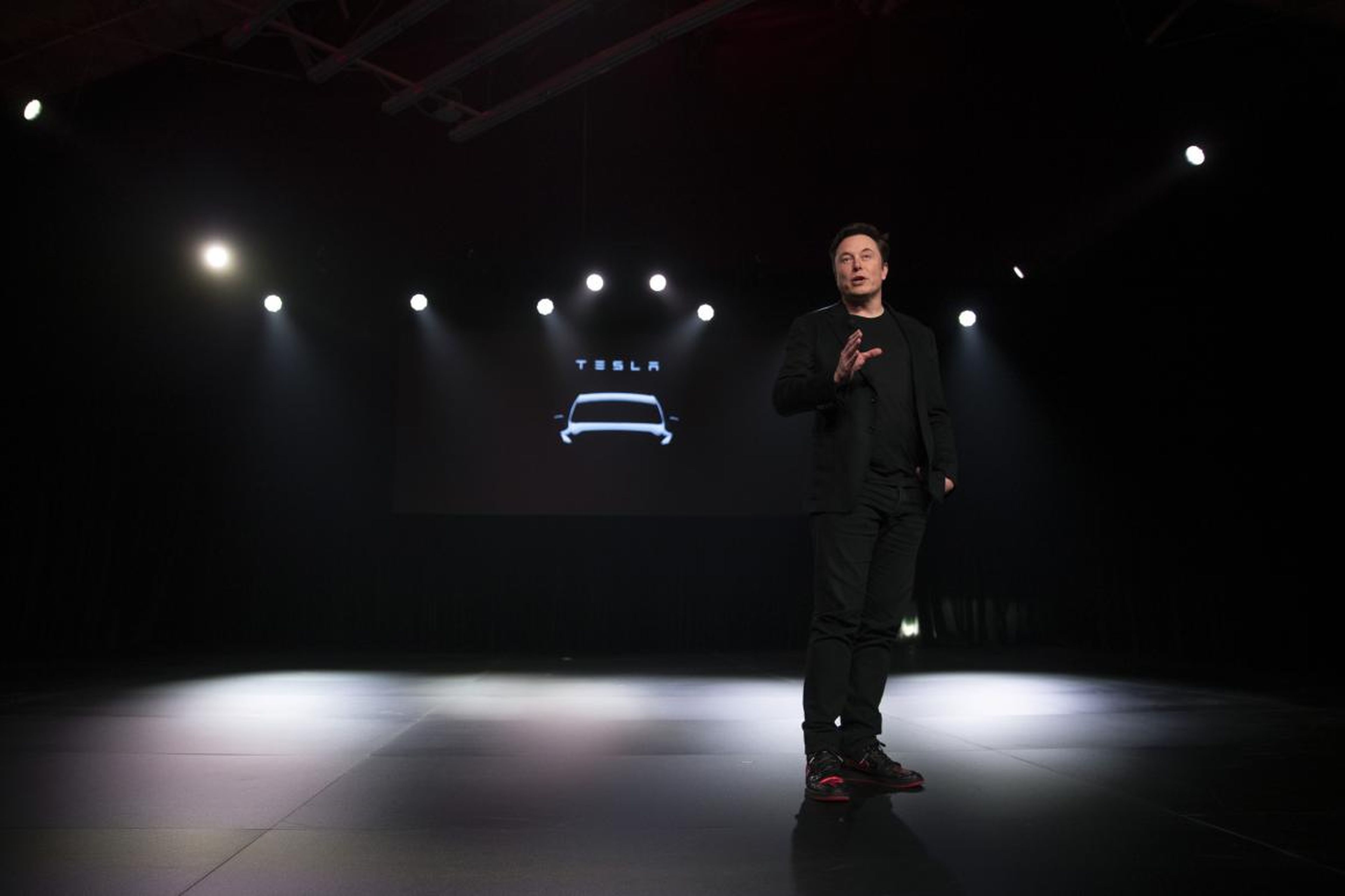Tesla CEO Elon Musk speaks before unveiling the Model Y at Tesla's design studio Thursday, March 14, 2019, in Hawthorne, Calif. The Model Y may be Tesla's most important product yet as it attempts to expand into the mainstream and