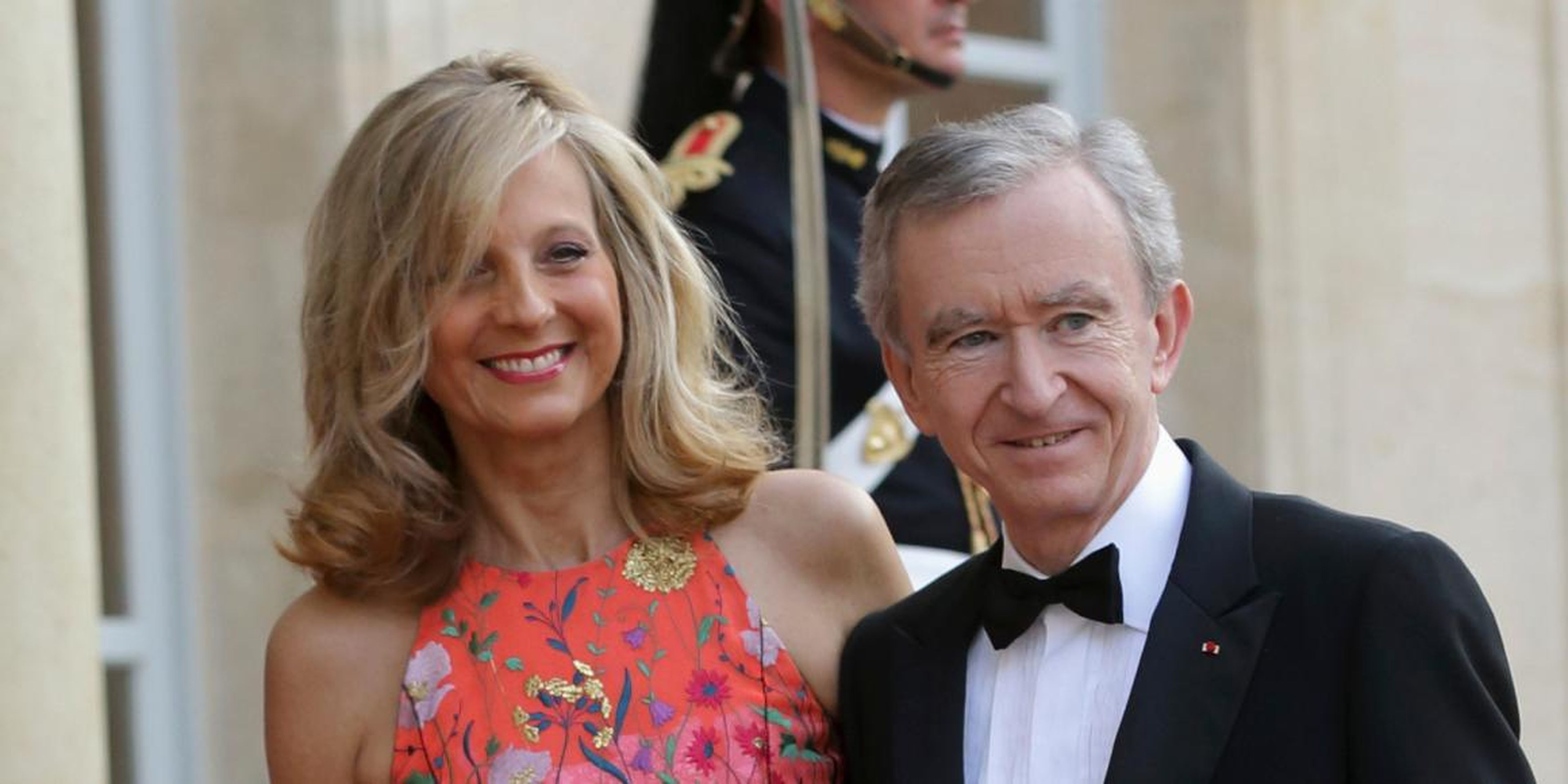 The French billionaire Bernard Arnault and his wife, Hélène Mercier, at the Élysée Palace in June 2014. His family and their conglomerate, LVMH, have pledged 200 million euros to help the Notre-Dame reconstruction.