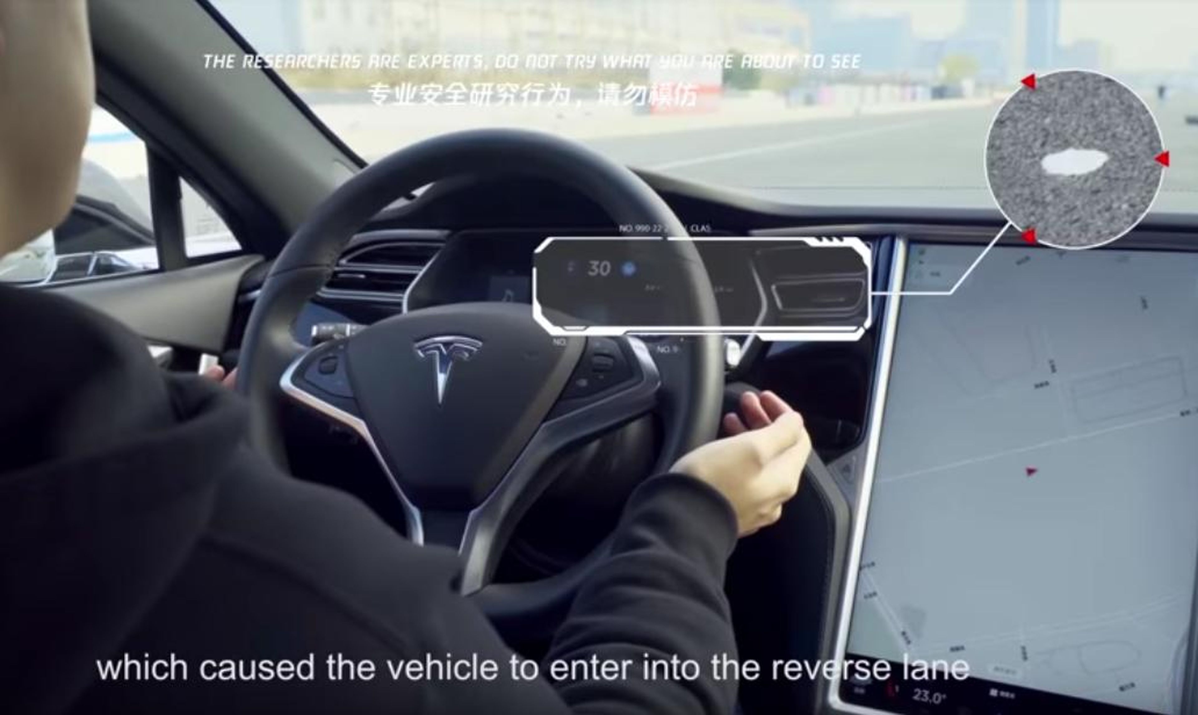 Hackers steered a Tesla into oncoming traffic by placing 3 small stickers on the road