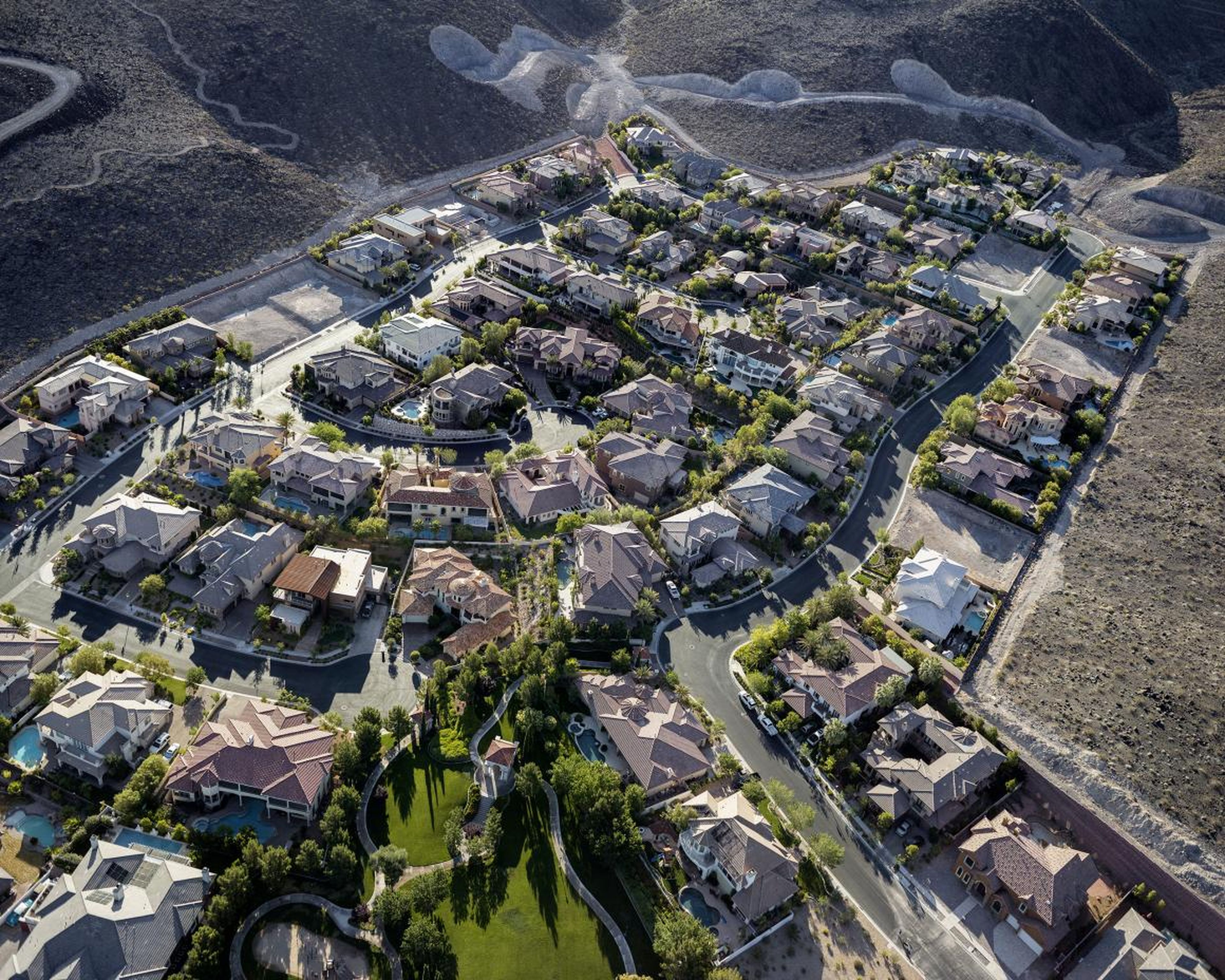 This image, an aerial view of a gated community in Henderson, Nevada, brought the question of sustainability to Little's mind. This image "talks about the environmental effects of privilege. It takes a lot of water to make that