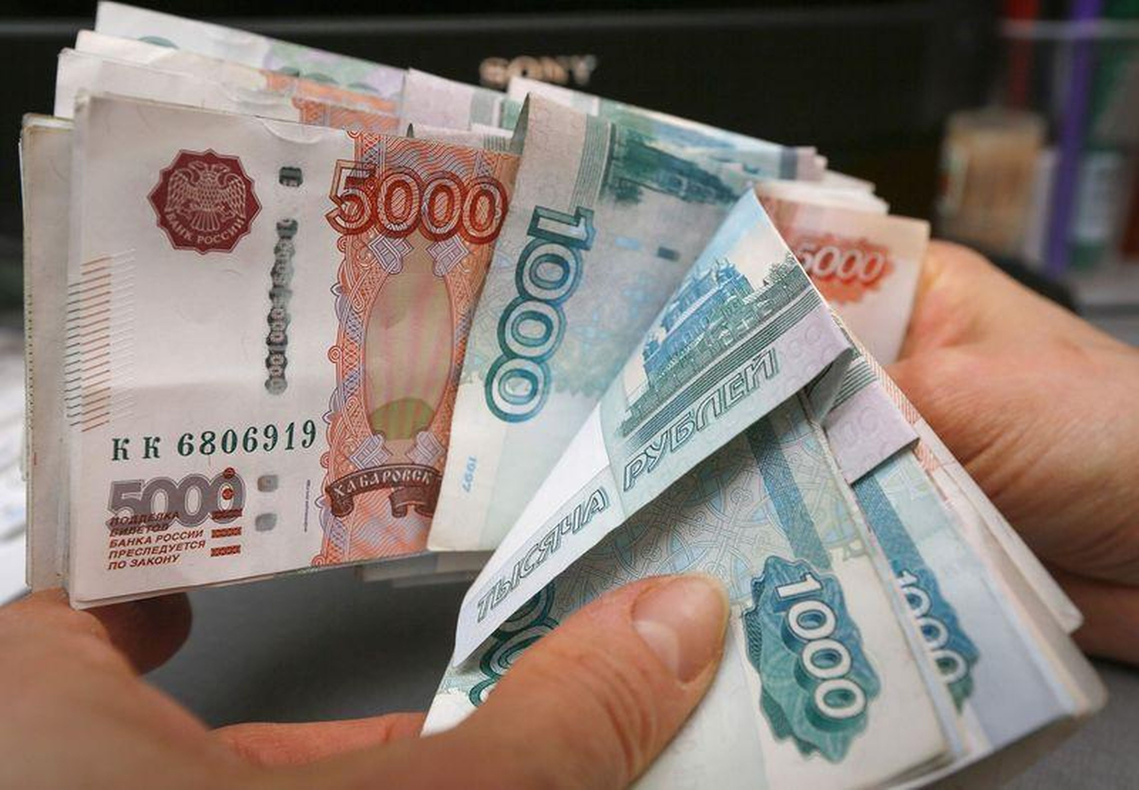 Russia's currency, the ruble, has dropped in value by 50% this decade