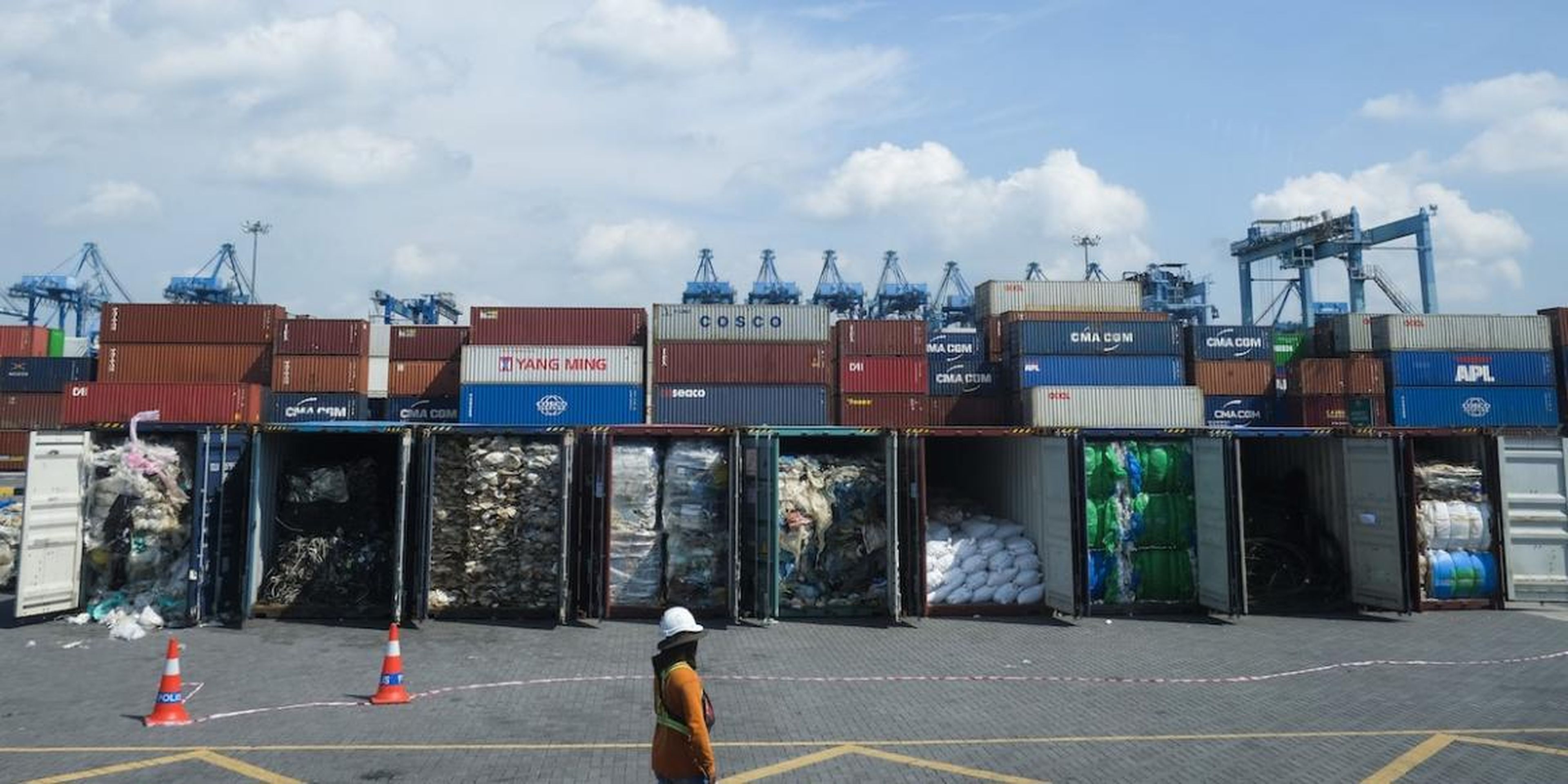 Containers filled with plastic waste seen Tuesday in Port Klang, Malaysia, before being sent back to the country of origin.