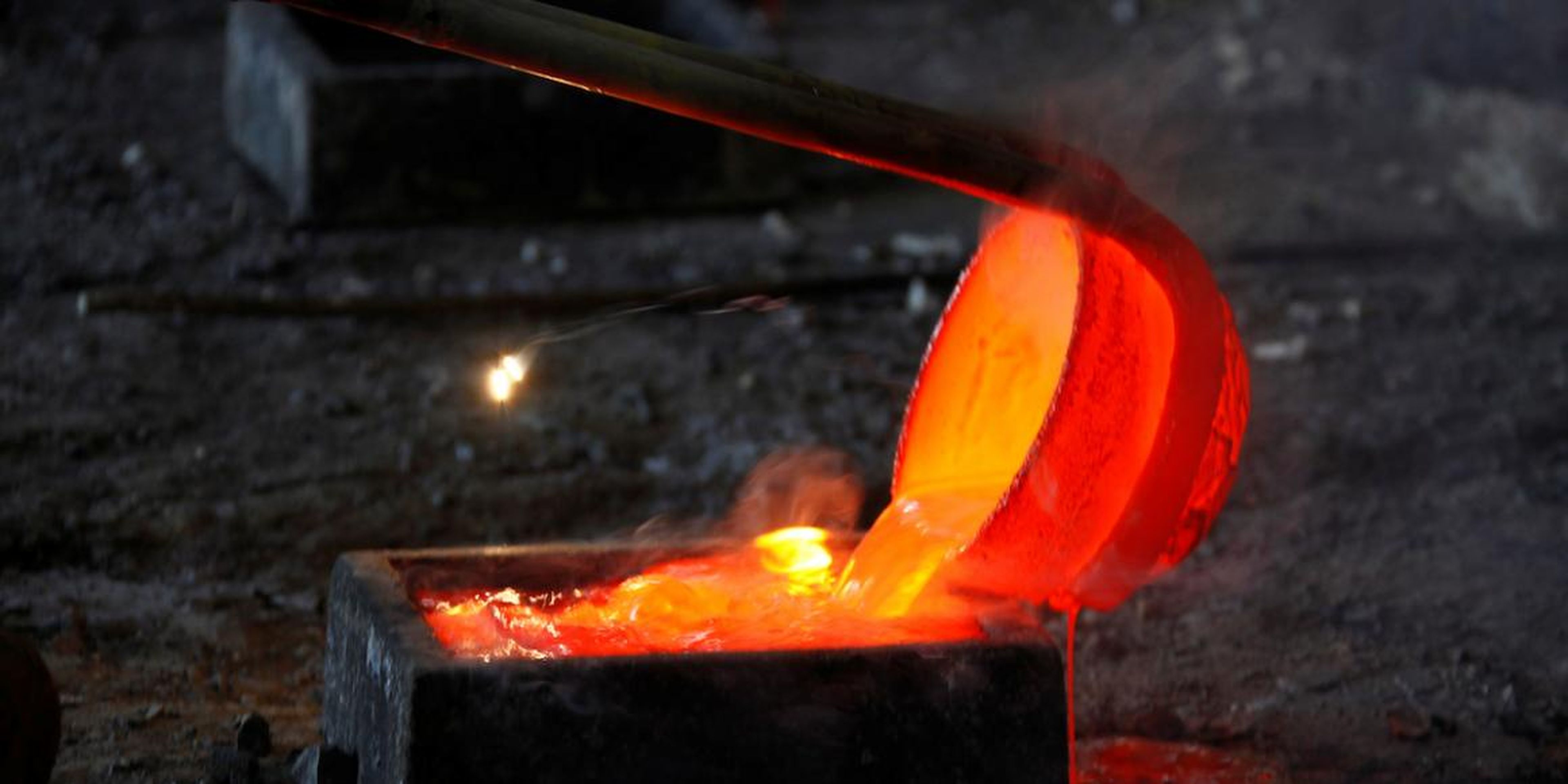 Molten lanthanum, a rare-earth metal, being poured into a mold at Jinyuan Company's smelting workshop near Damao in Inner Mongolia, China, in October 2010.