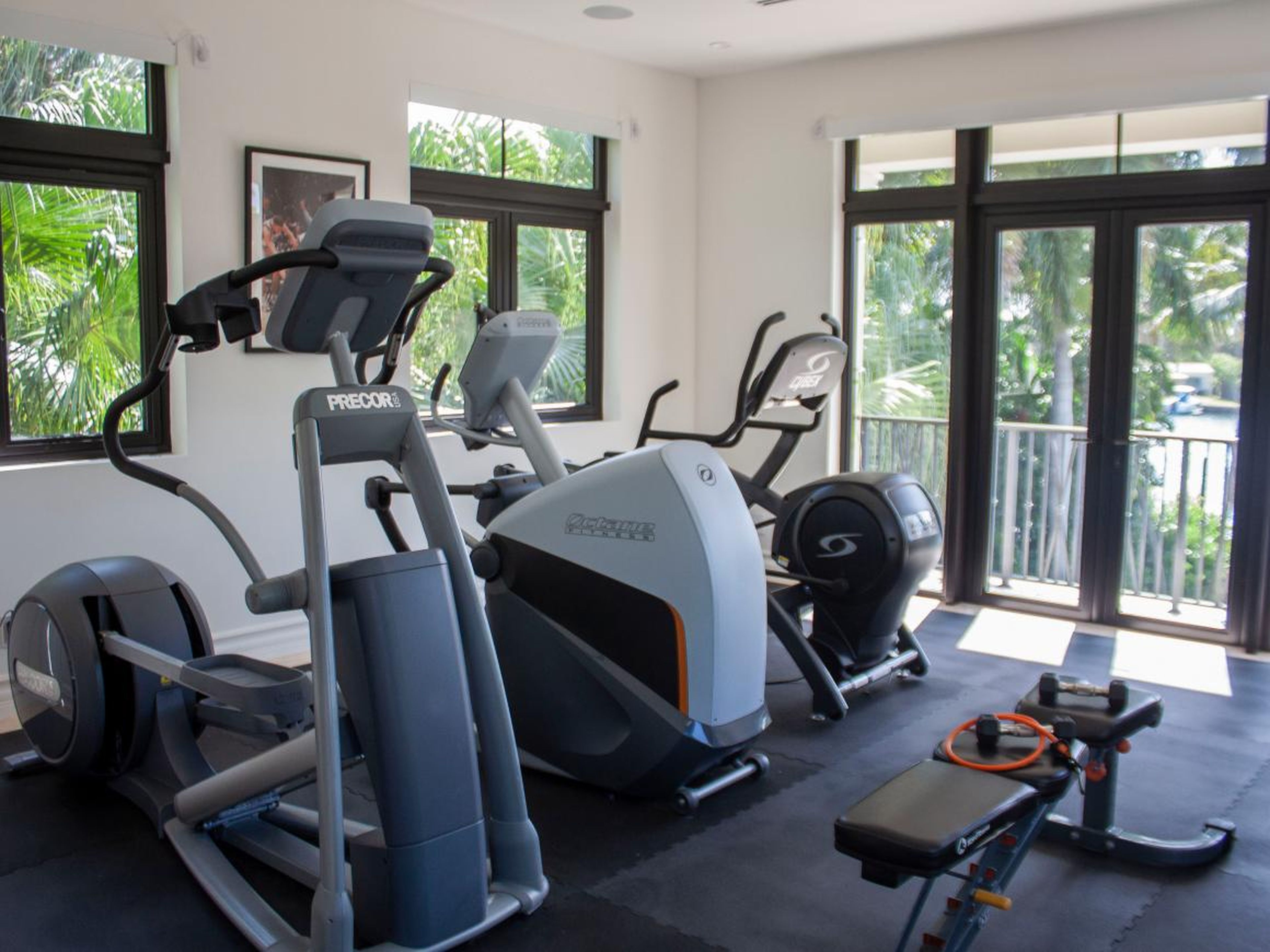 One sunny room is set up as a home gym, but it could also be turned into another bedroom.