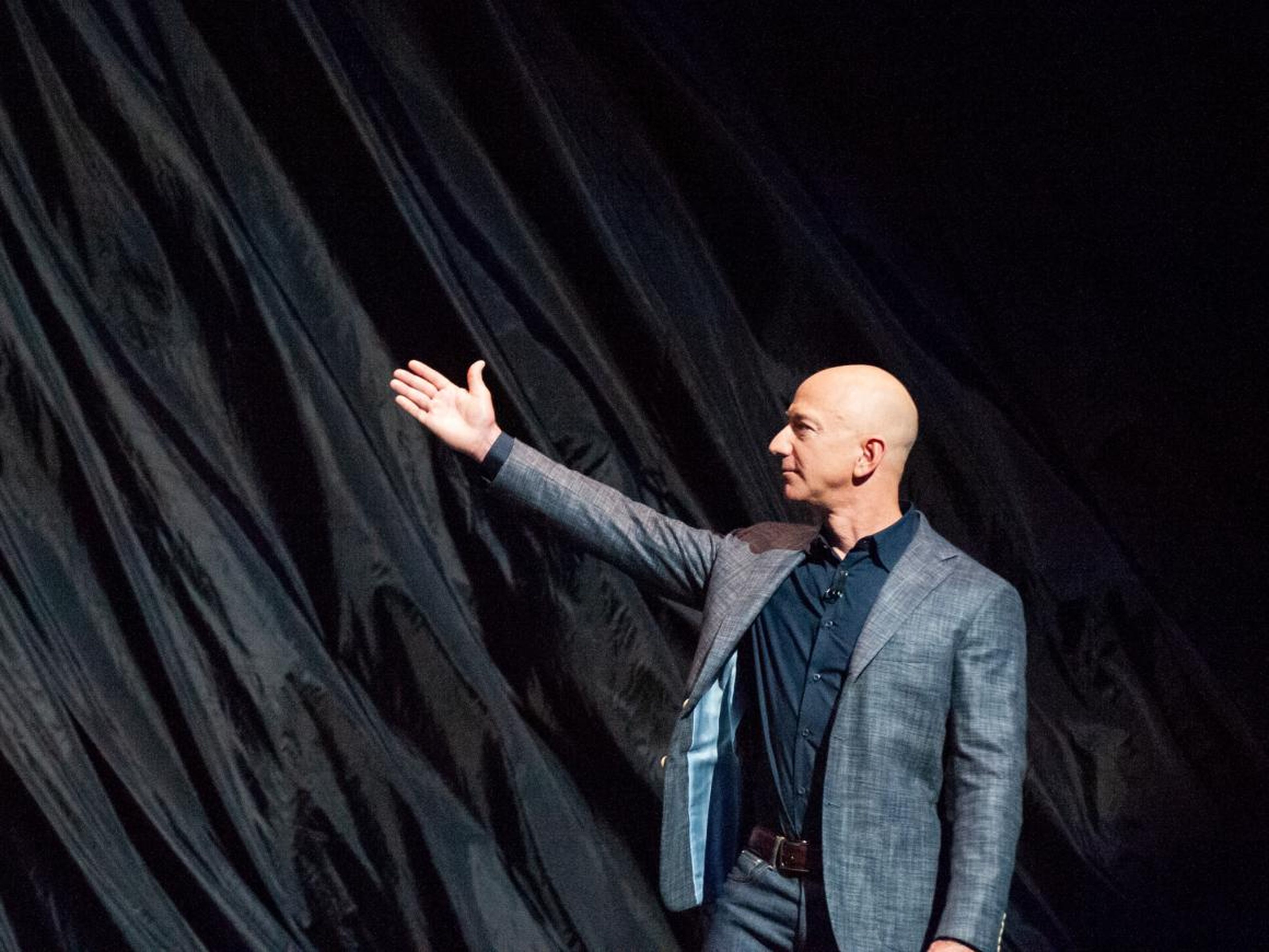 Jeff Bezos gestures while unveiling Blue Origin's lunar lander concept, called Blue Moon, on May 9, 2019.
