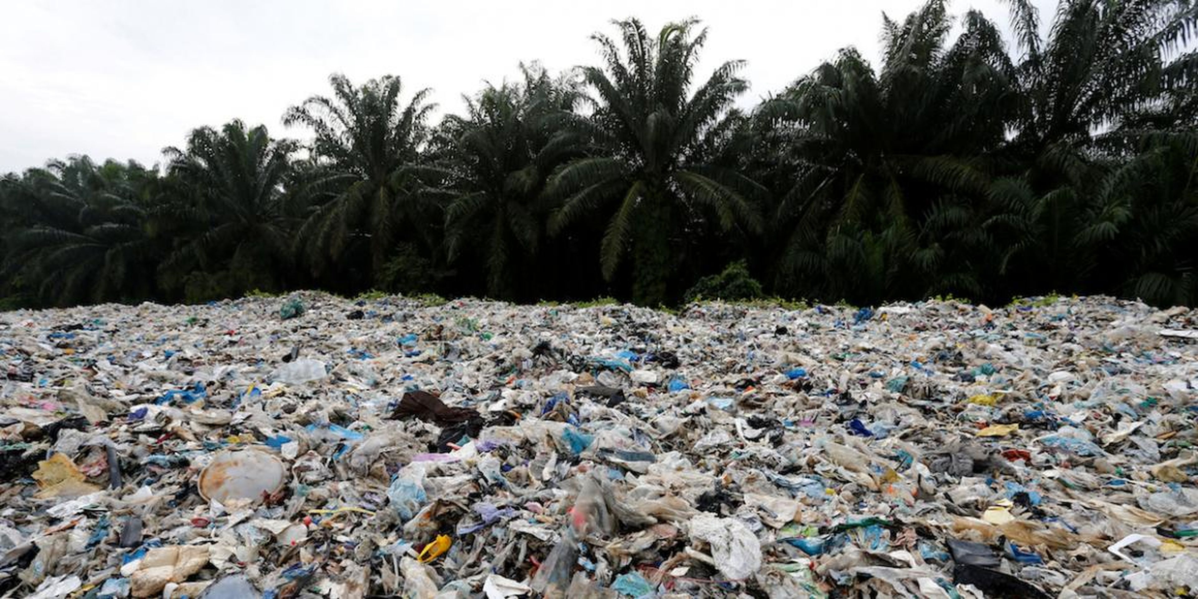 Plastic waste piled outside an illegal recycling factory in Jenjarom, in Malaysia's Kuala Langat district, on October 14.