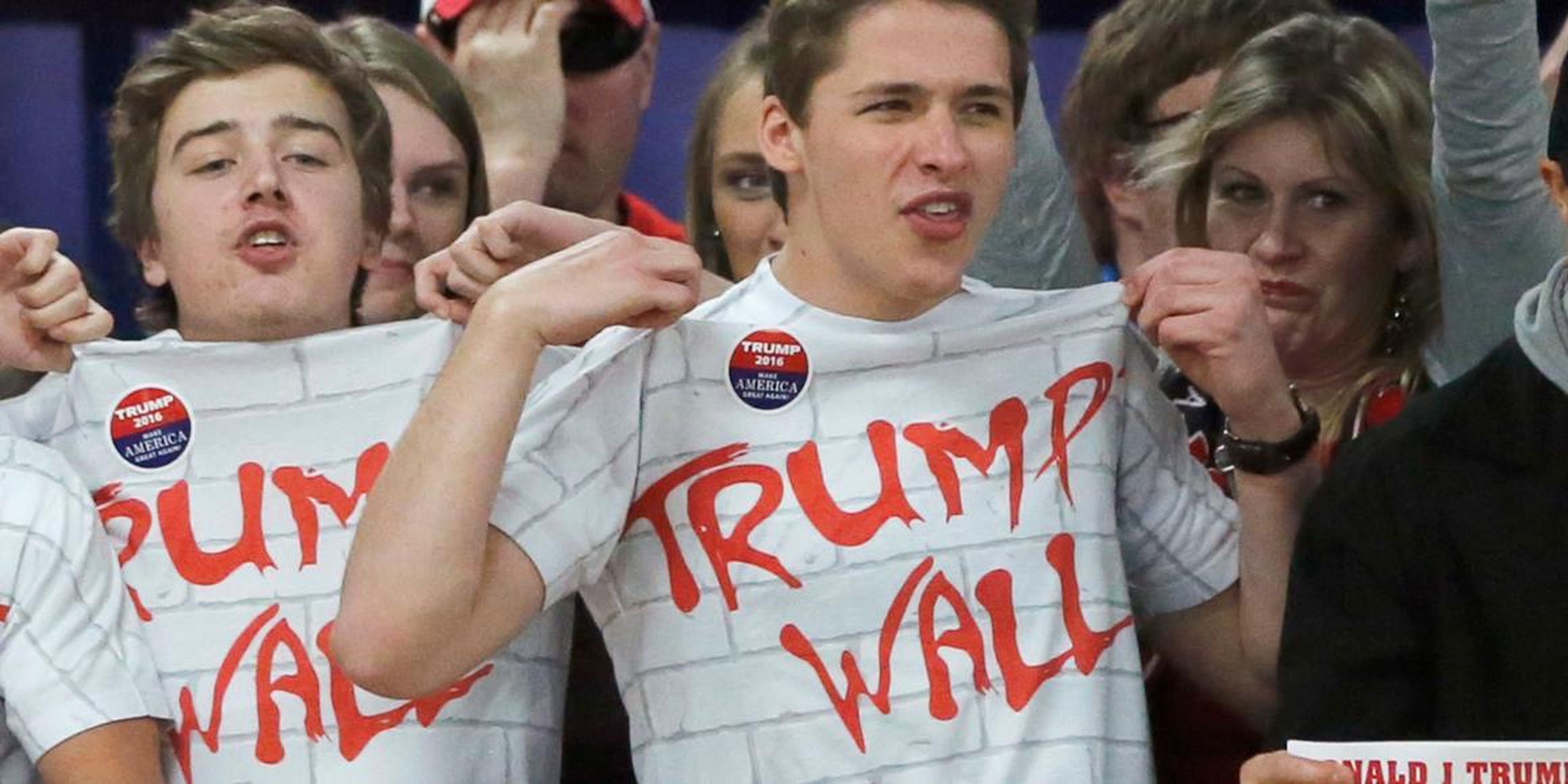 Supporters chanting "build that wall" at a rally for Trump, then a Republican presidential candidate, in Rothschild, Wisconsin, in April 2016.