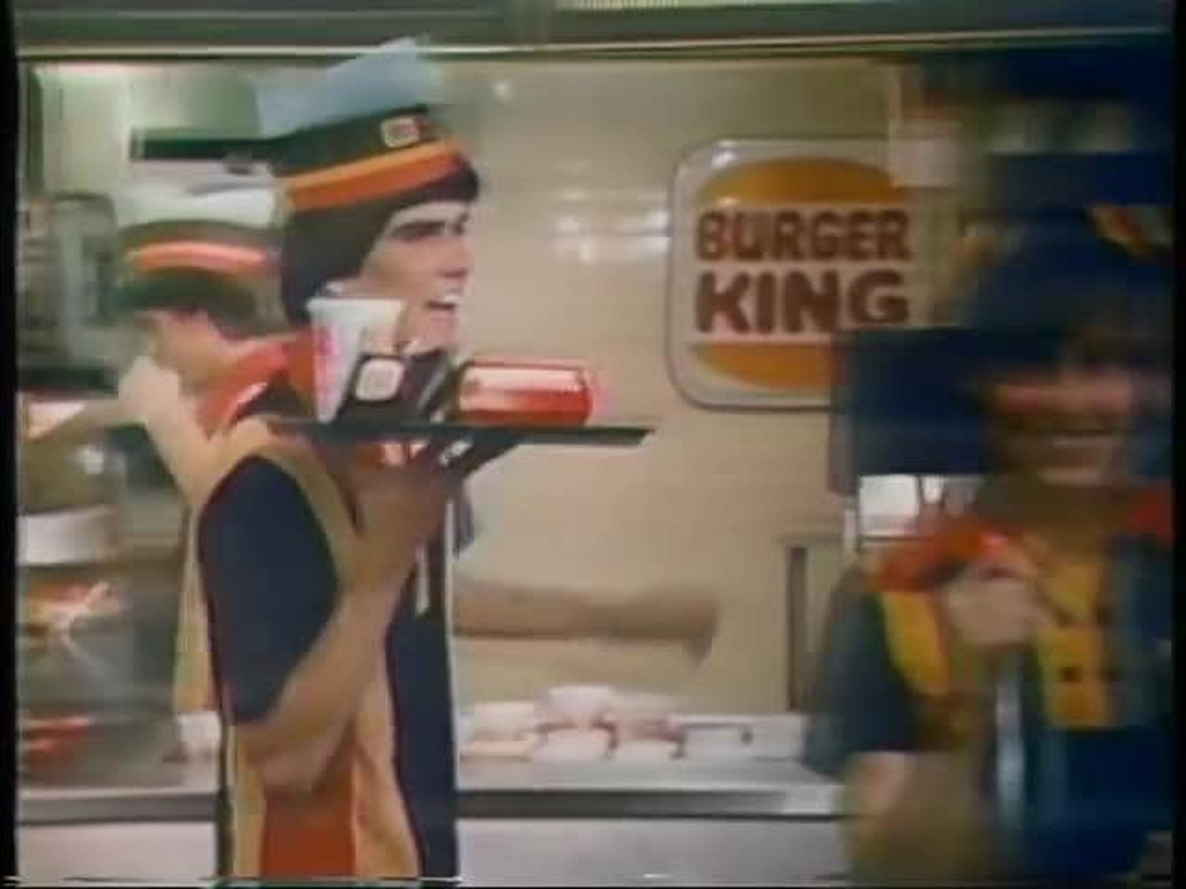 By 1979, Burger King added a dose of black and a dash of white to their uniforms. According to Machado, the 70s were a golden era of creativity when it came to the brand's uniforms.