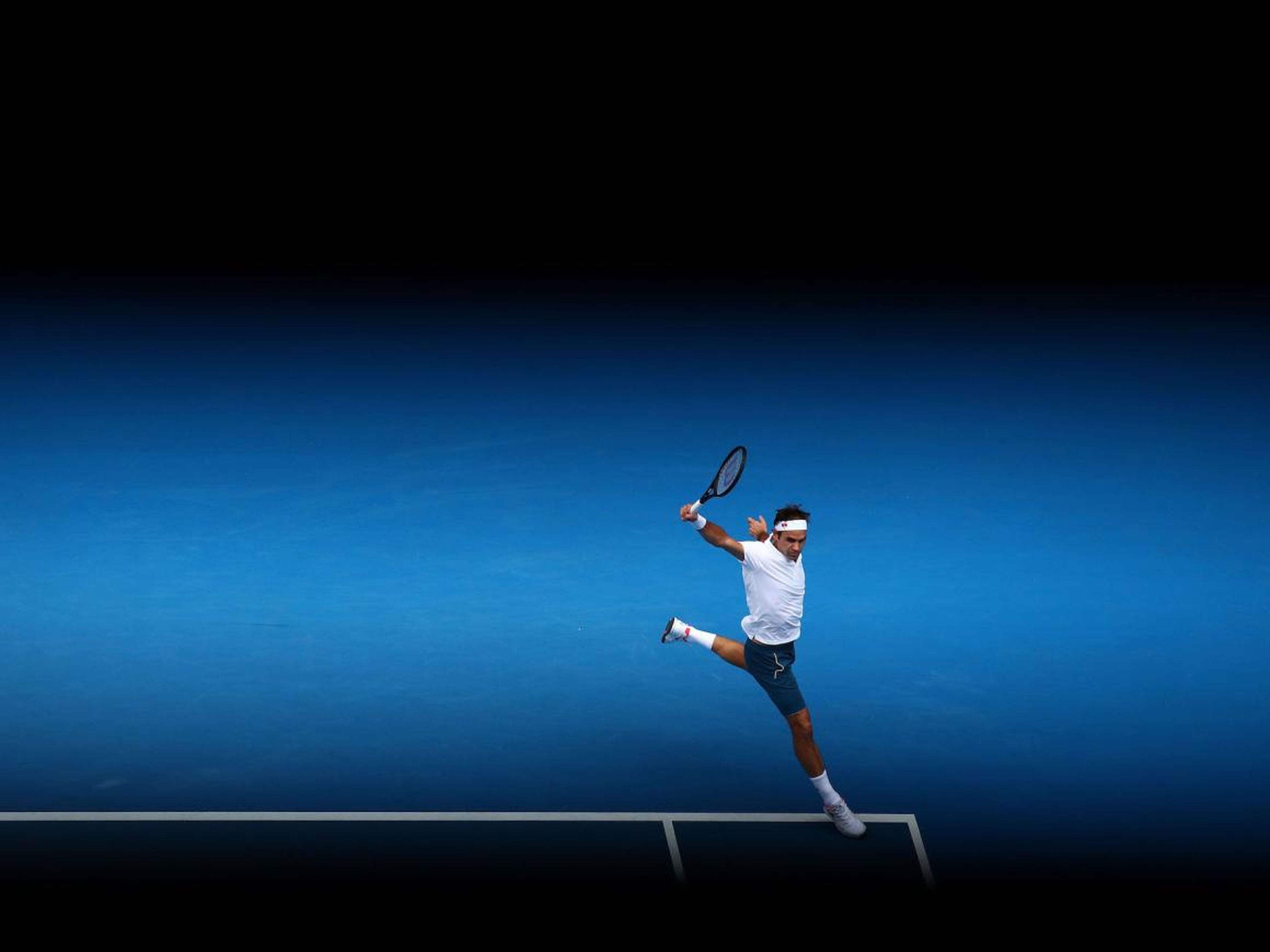 Federer's back-hand somehow looks smoother on the blue court at the Australian Open.