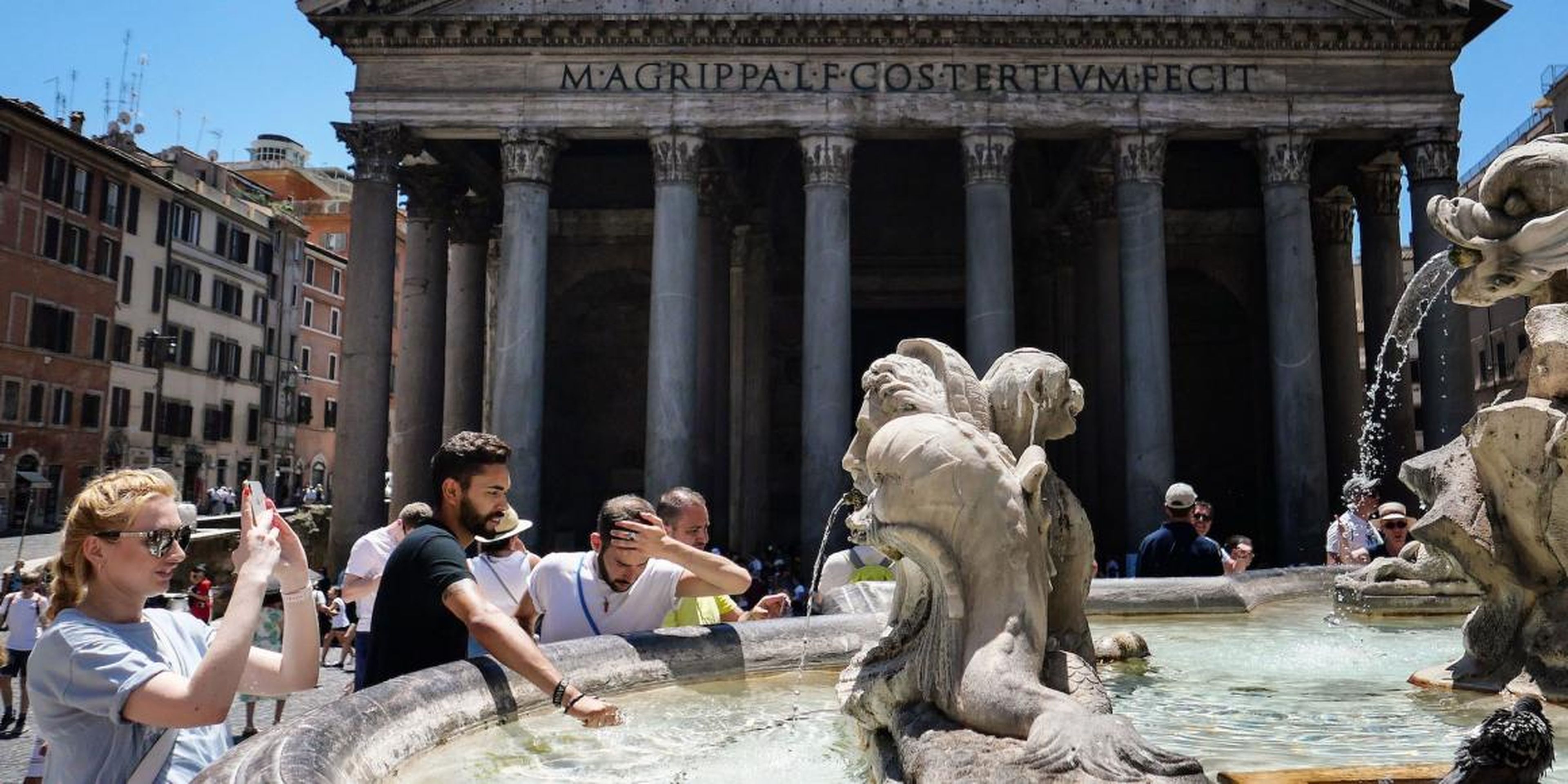 Tourists at a fountain in front of the Pantheon in Rome on Monday.