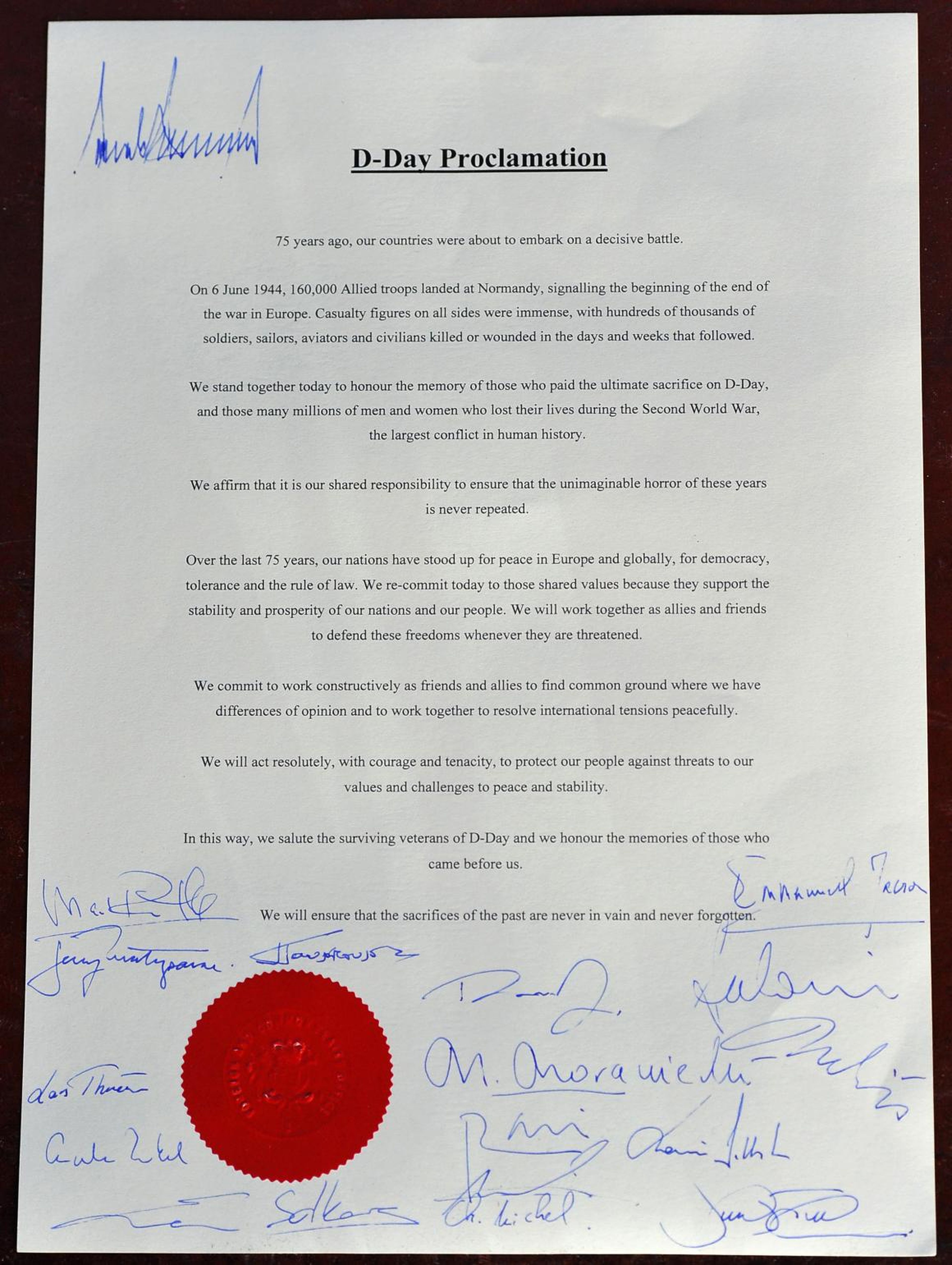 Trump's lonely signature at the top of a D-Day proclamation is making the rounds on social media after other world leaders signed at the bottom