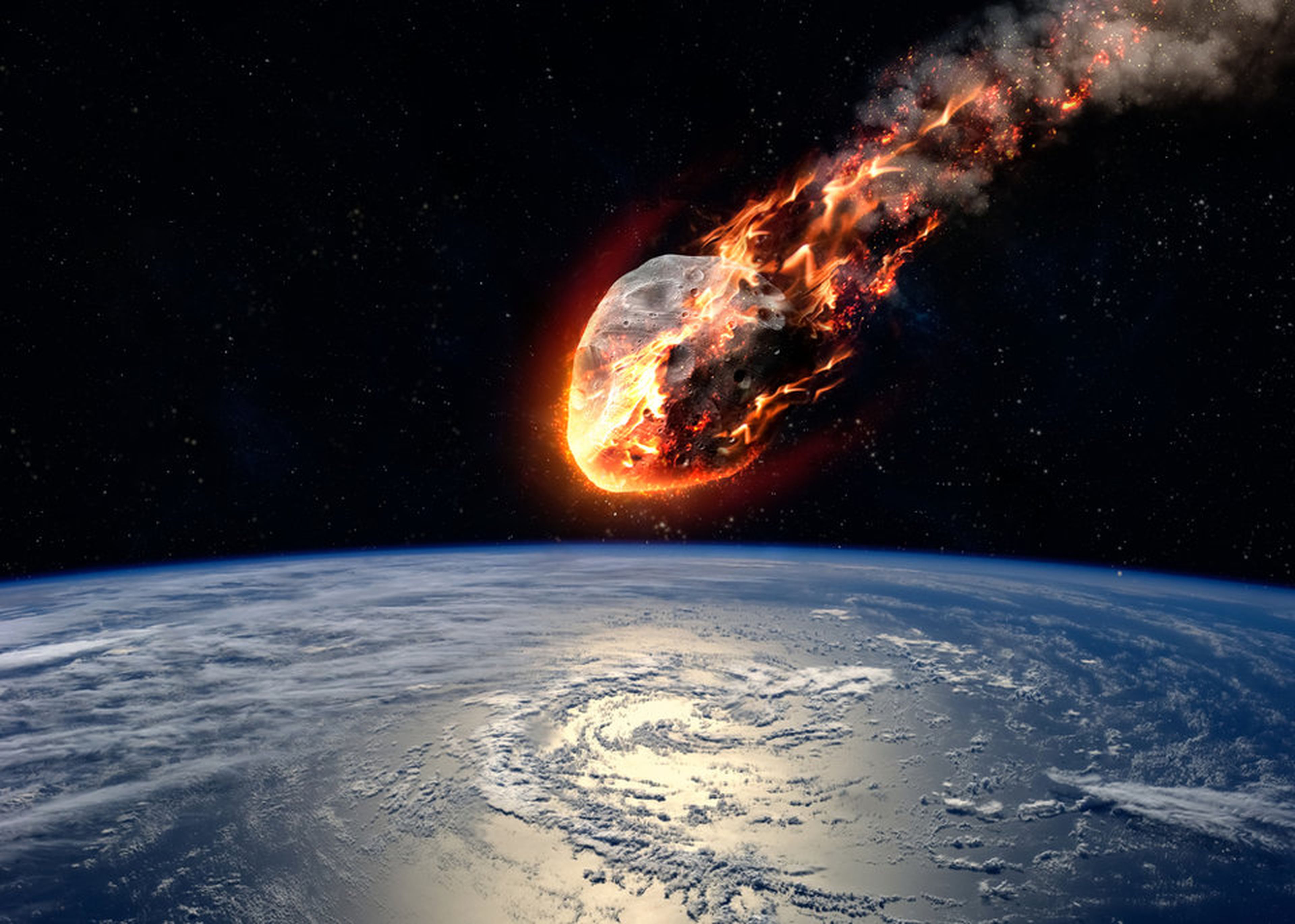 Simulación de un asteroide dirigiéndose hacia la Tierra.