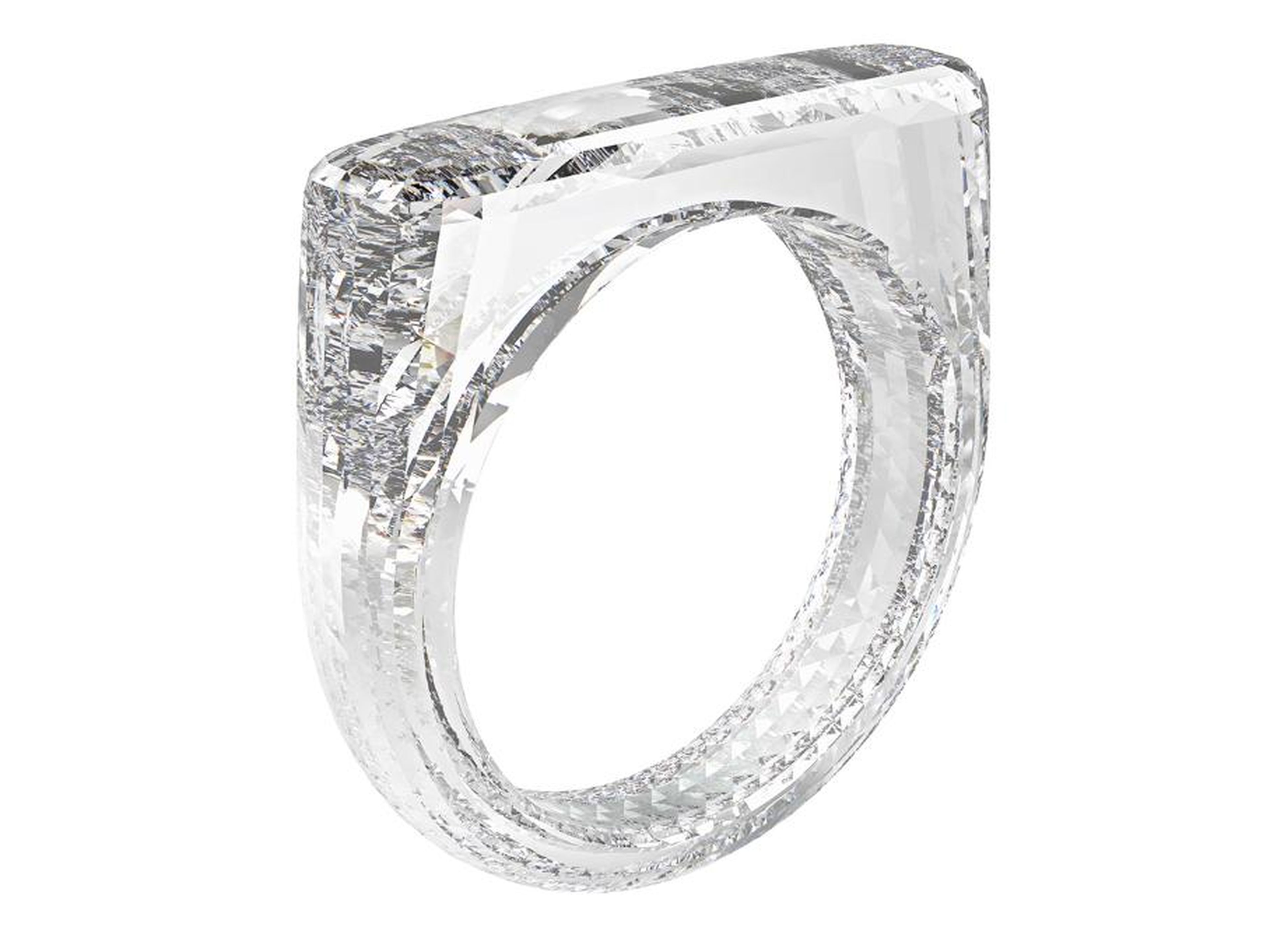With designer Marc Newson, Ive helped design several products for a charity auction, including this $250,000 ring made entirely out of a single chunk of diamonds.