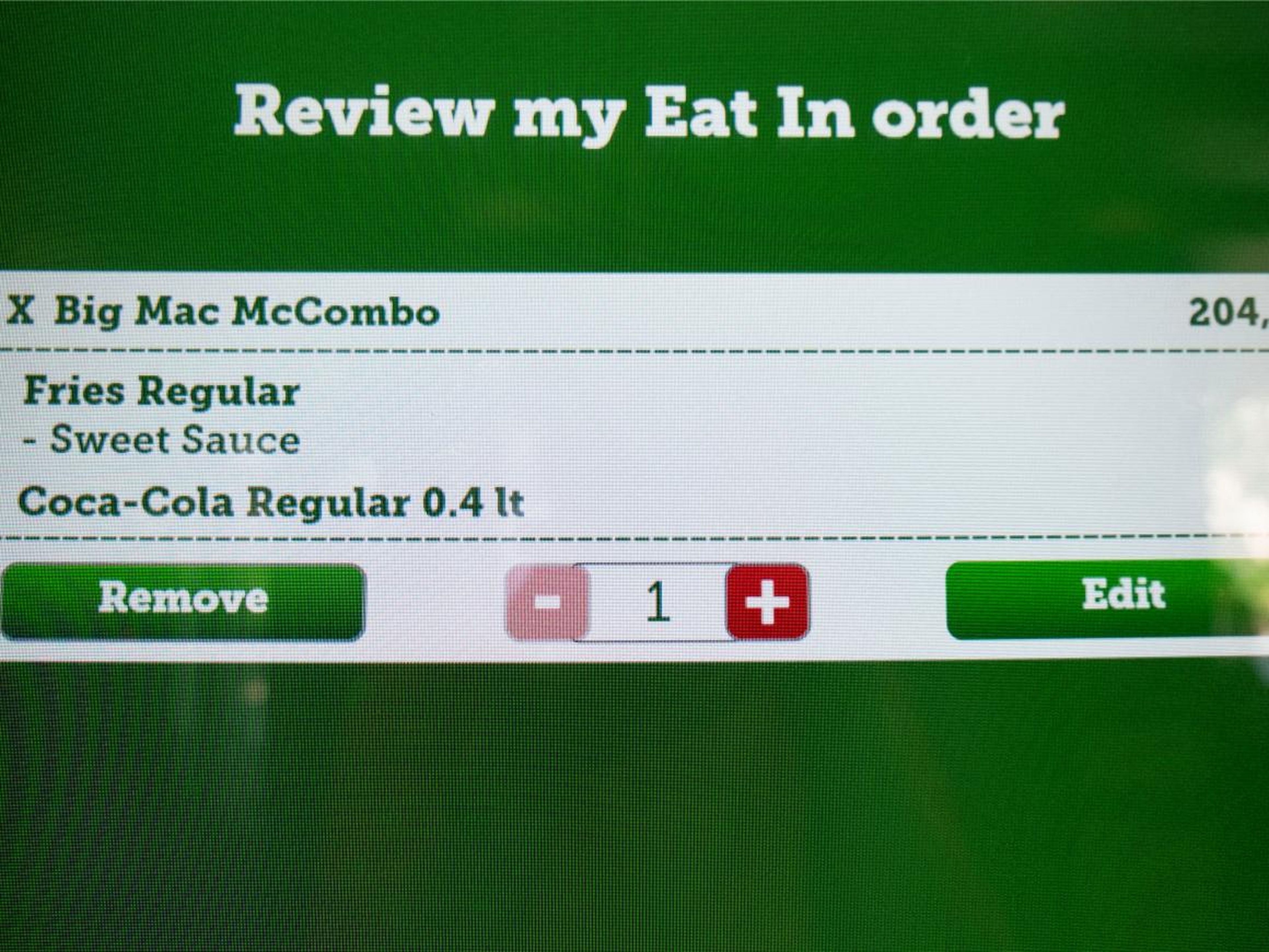 I reviewed my order: a Big Mac McCombo, fries with sweet sauce (I'm not a fan of Ketchup), and a Coke. The total came out to 204 rubles, or about $3.22.