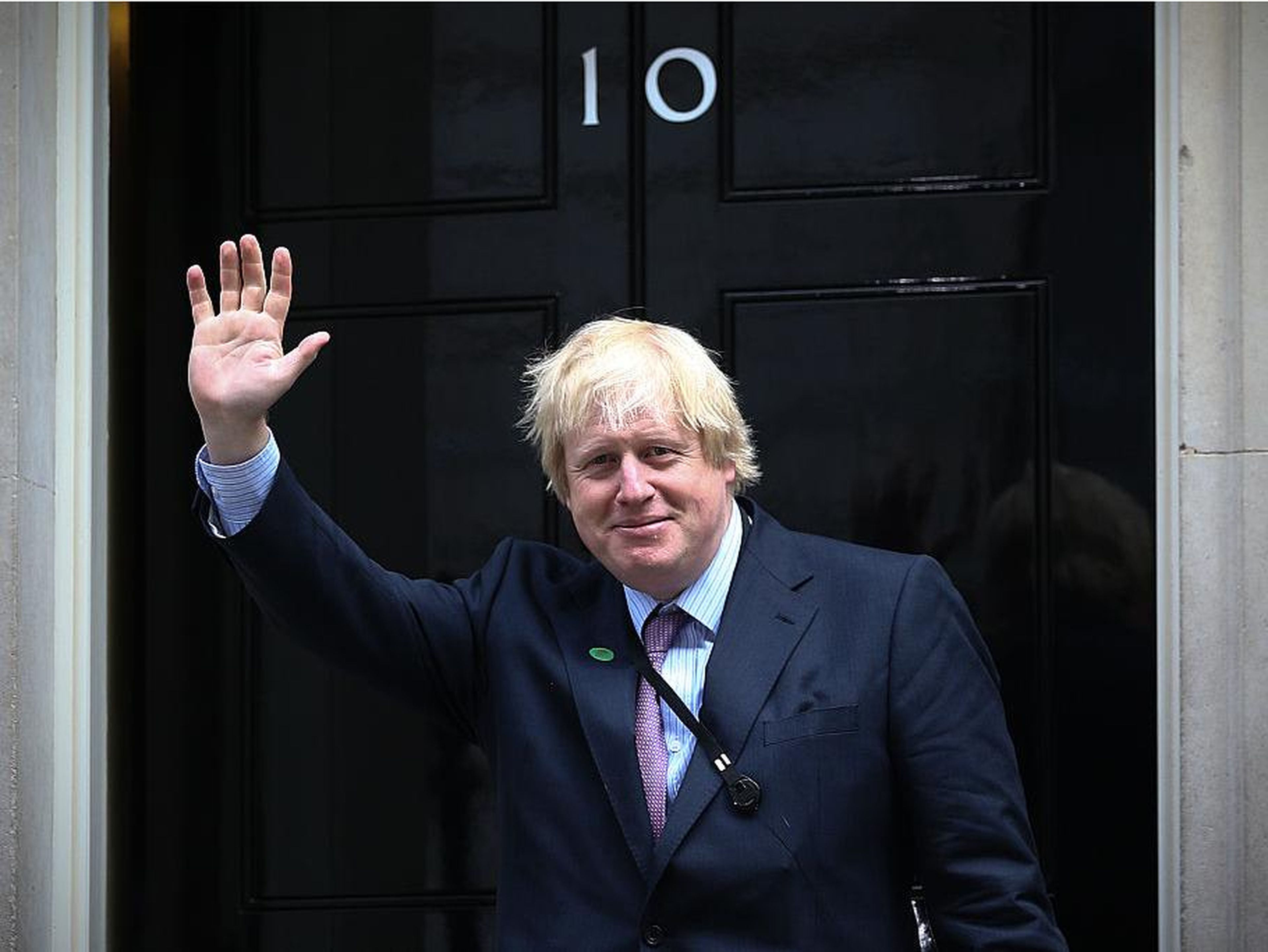Johnson enters Downing Street as prime minister for the first time