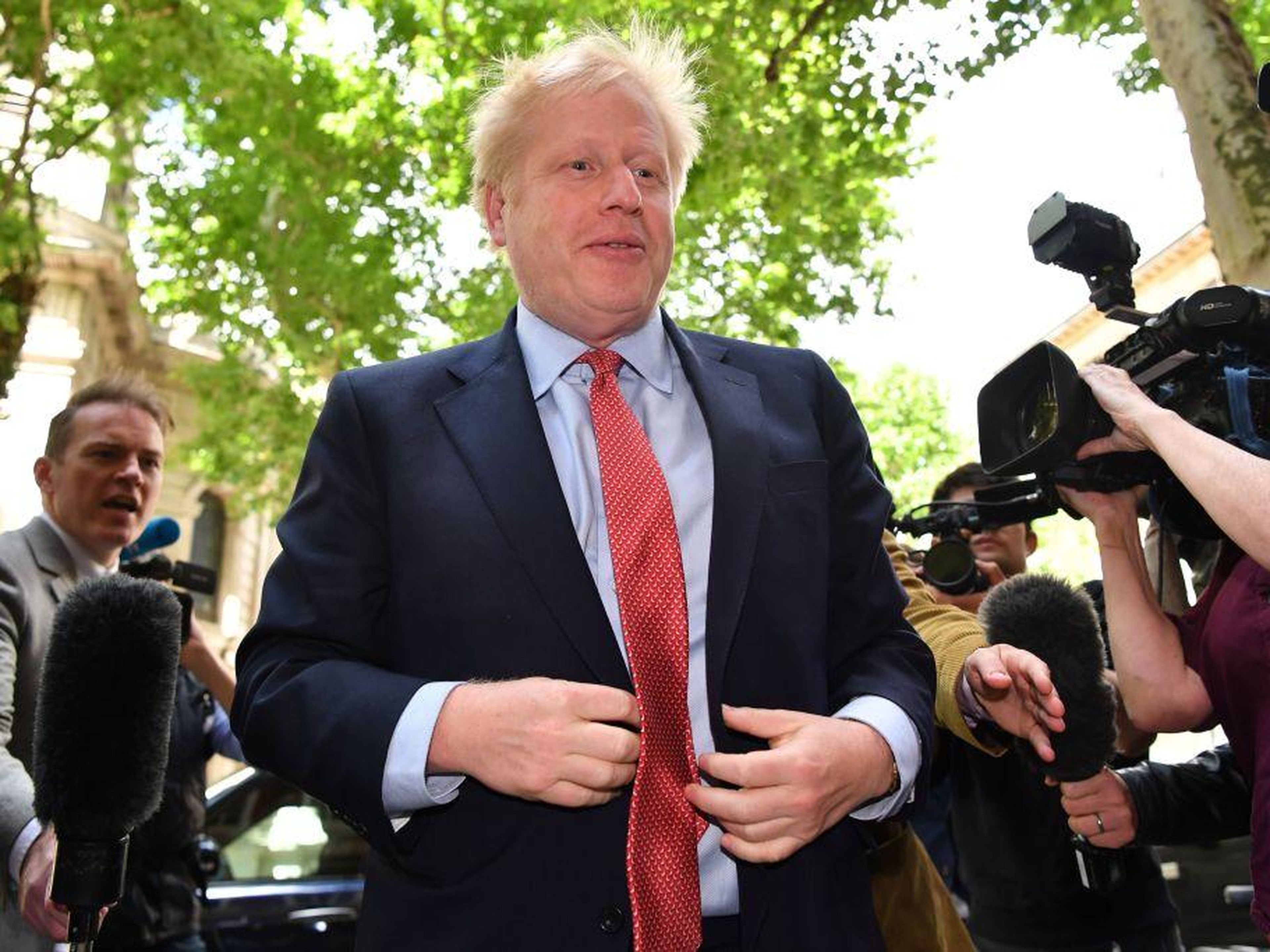 Johnson returns to campaign HQ to plan his government