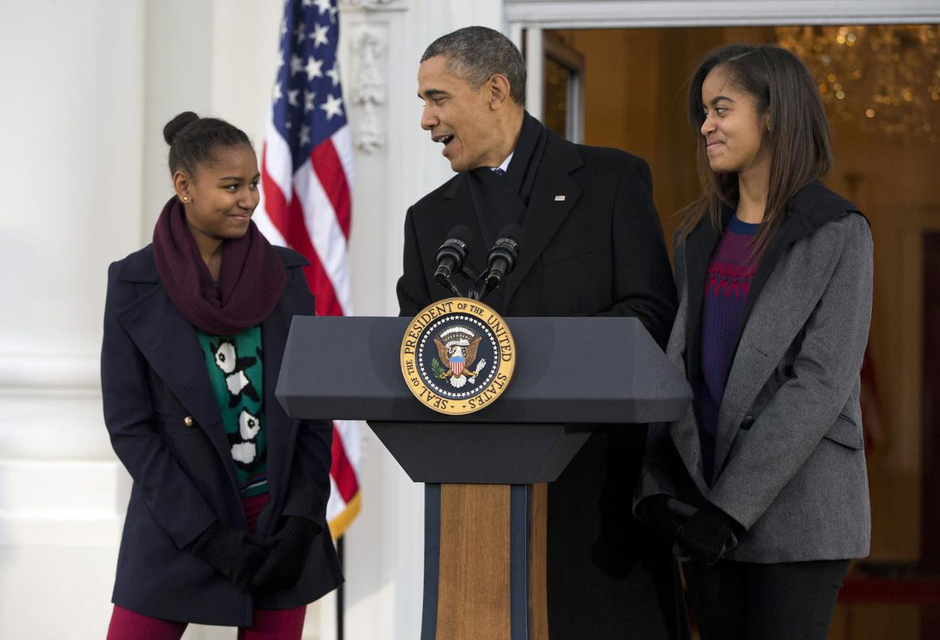The president, seen with his daughters, made a joke during remarks in November 2013 for the Thanksgiving tradition of saving a turkey from the dinner table with a "presidential pardon."
