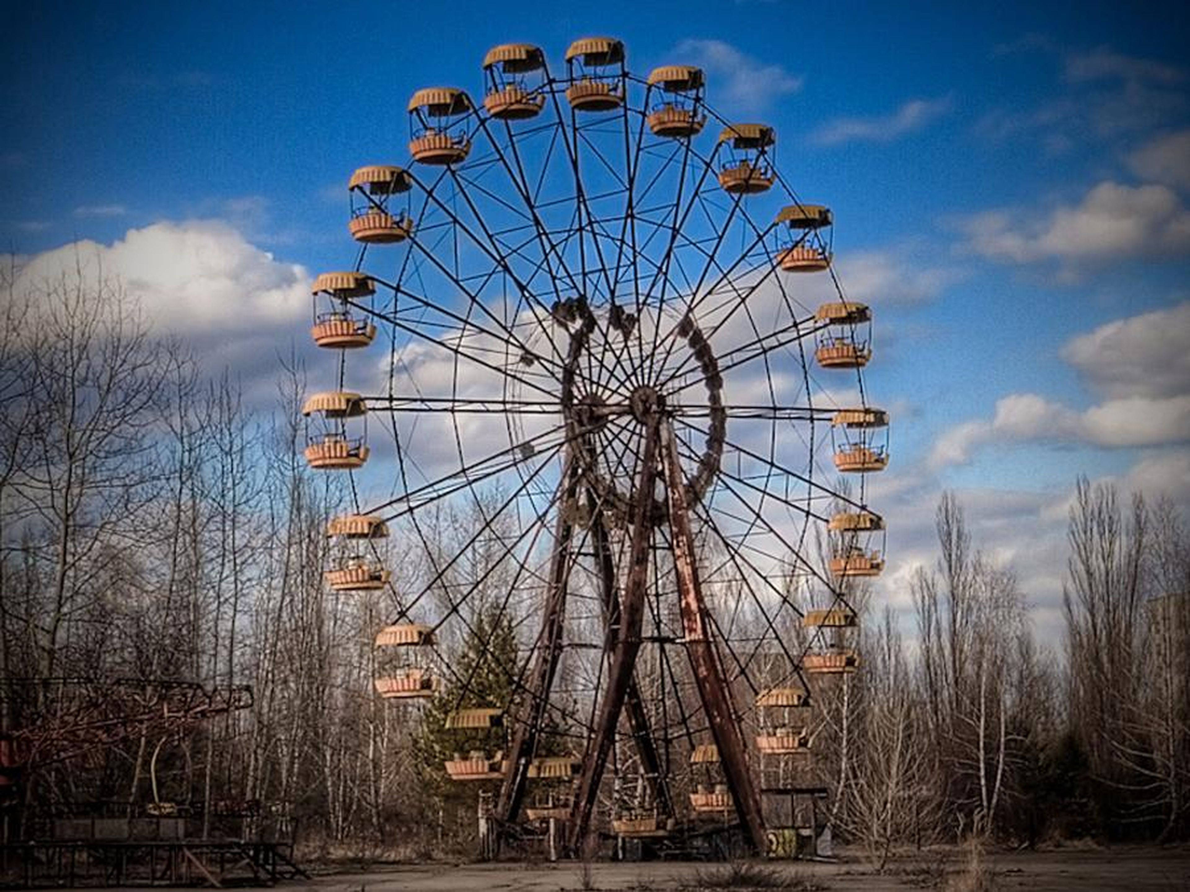 Some reports say a brand-new Ferris wheel opened early to entertain residents after the accident.