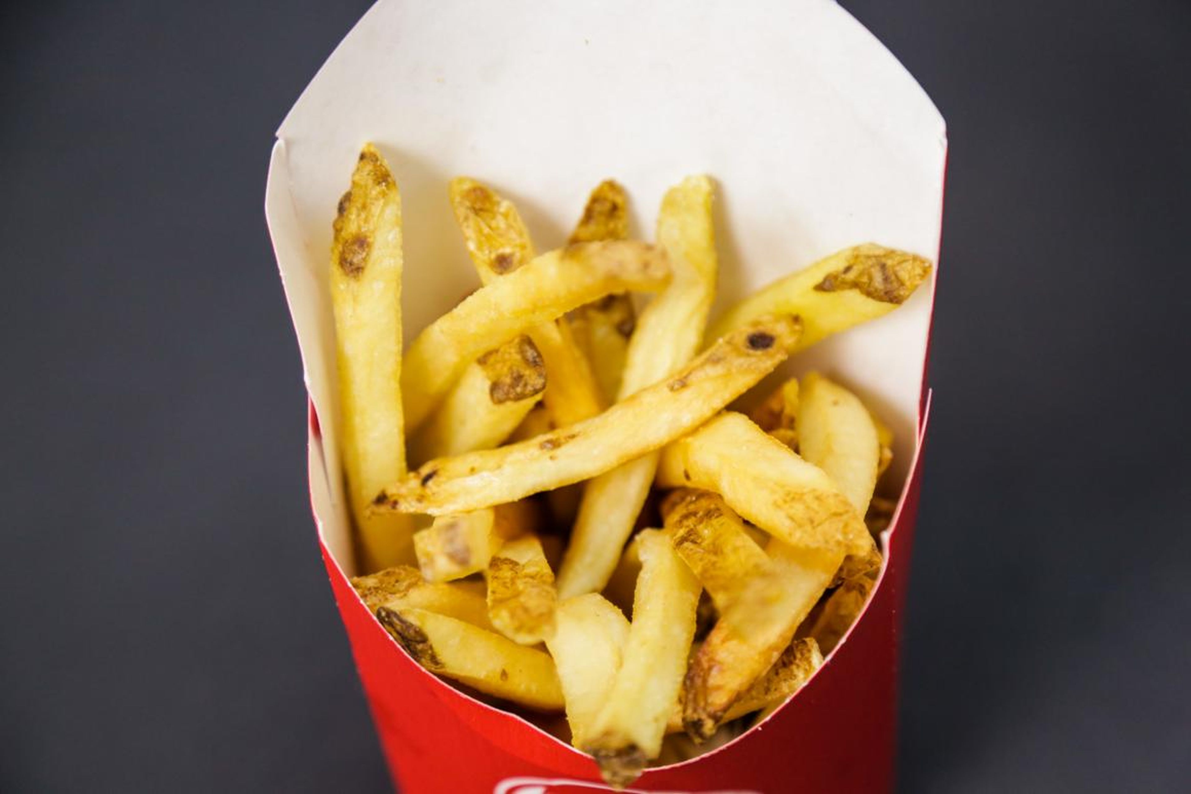 Sometimes crispy, sometimes not, these fries taste kind of like earthy, real potatoes, but they definitely have some metallic, processed undertones. They're kind of pungent, a little dry, with a texture like mashed potatoes. And