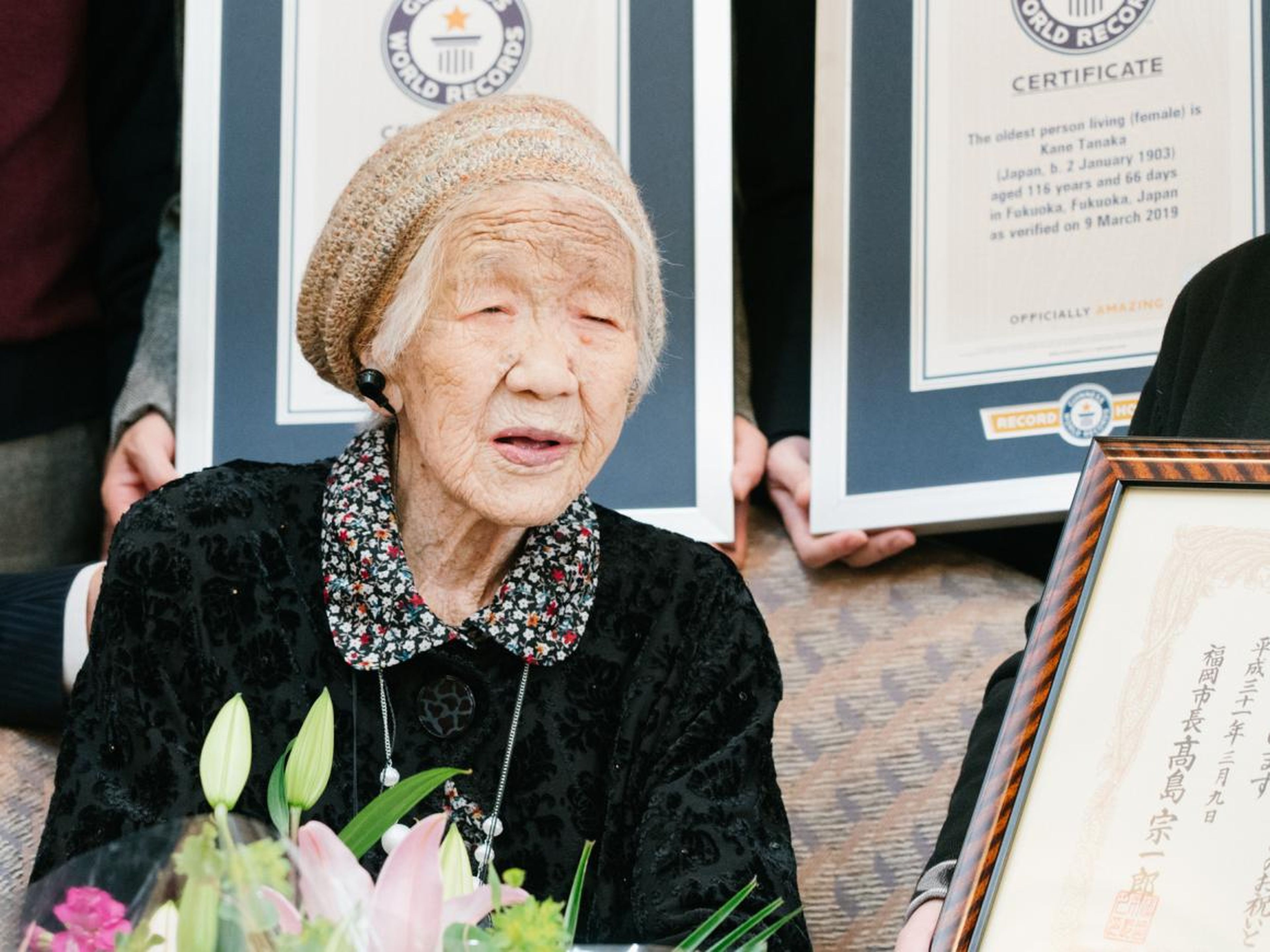 116-year-old Japanese woman Kane Tanaka holds a Guinness World Records certificate naming her the world's oldest person living during a ceremony in Fukuoka, Japan.