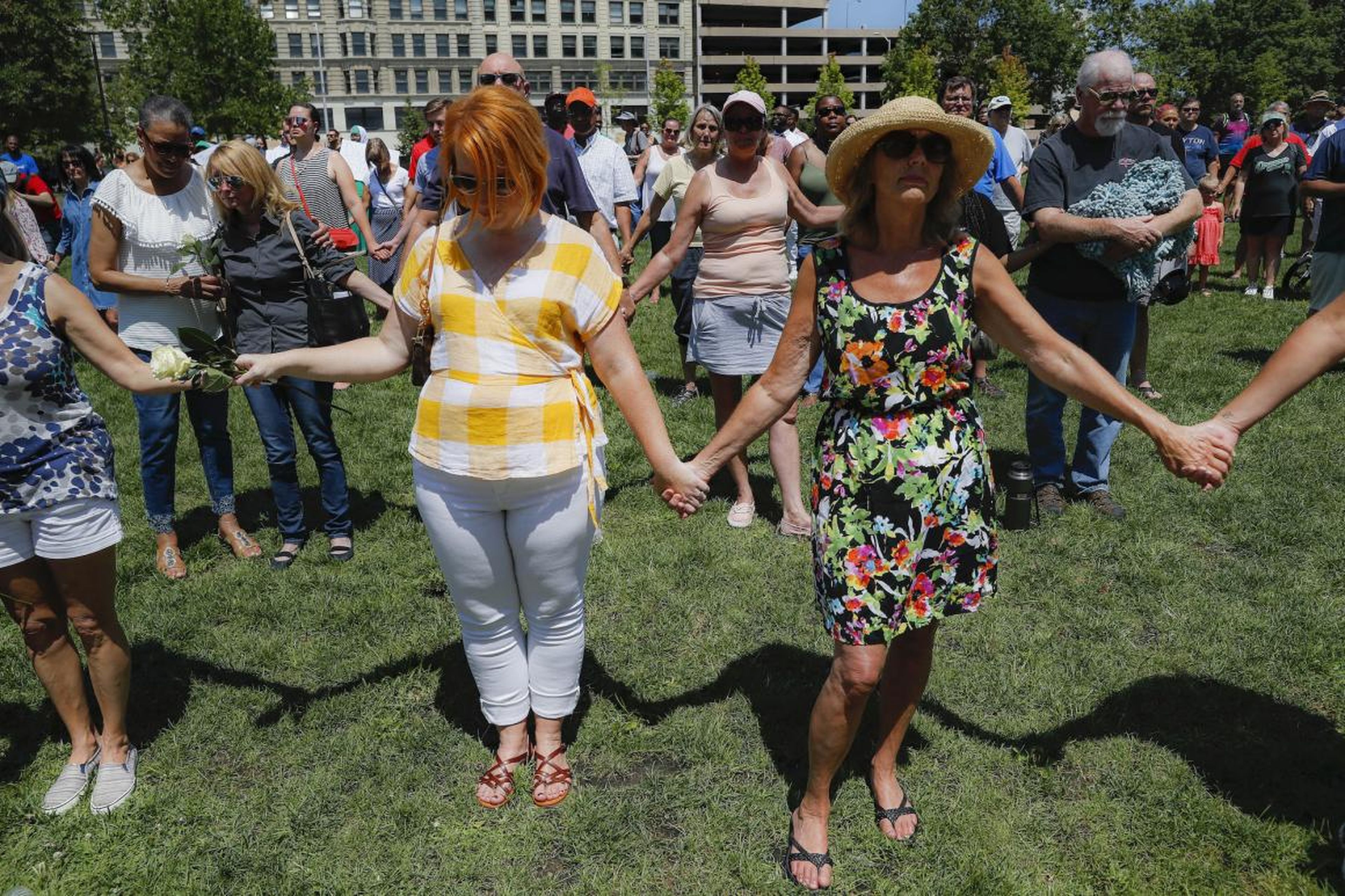 Mourners at a vigil following the mass shooting in Dayton.