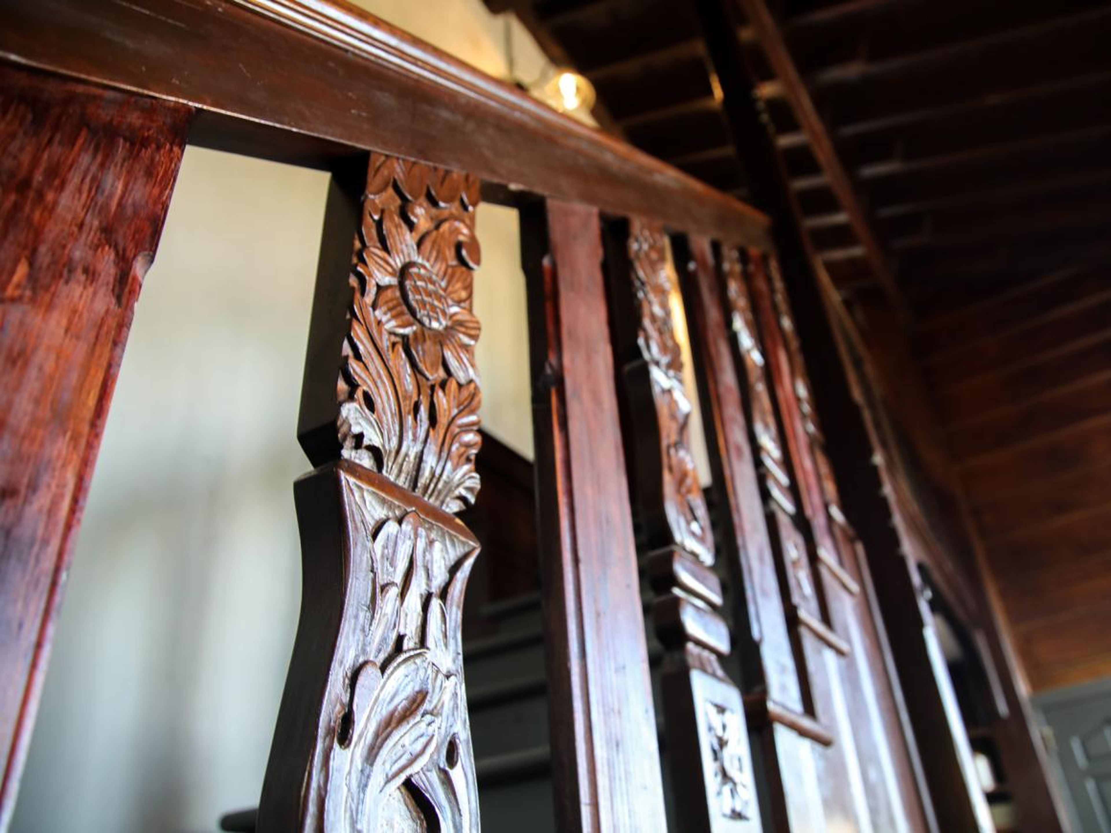 He integrated intricate woodwork into the home. The touches he made to the property are largely what remains today.