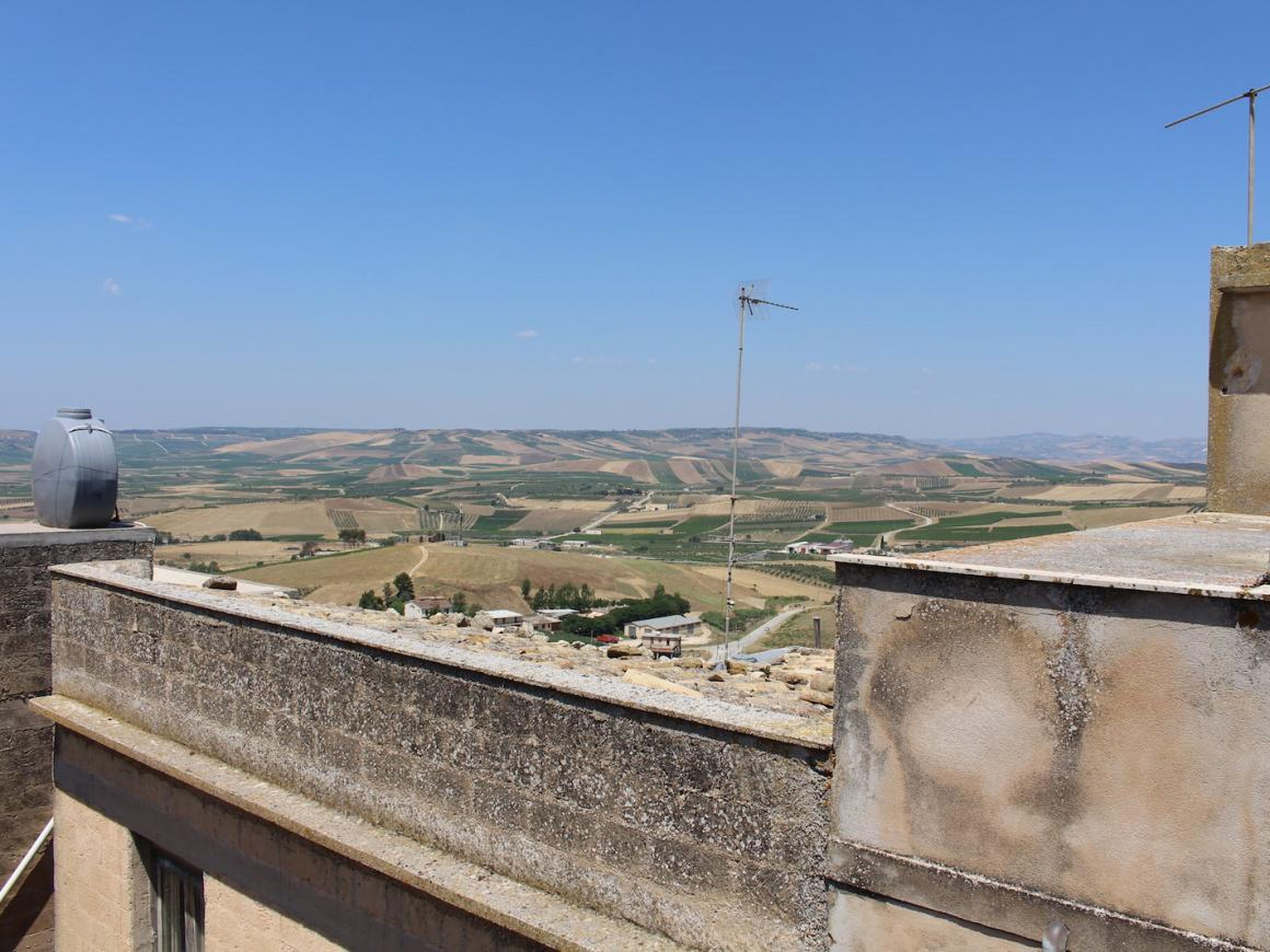 The real selling point of the property was the roof terrace, which boasted stunning views of the Sicilian countryside.