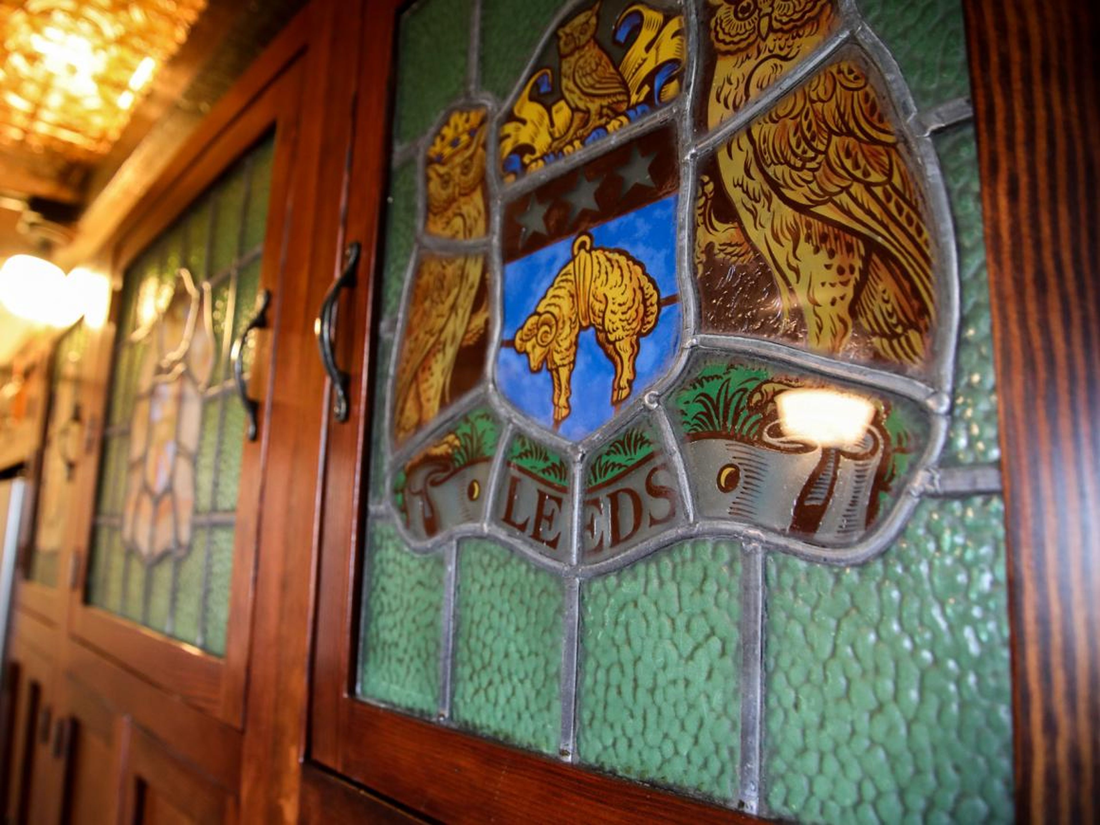 Stained-glass panels on the cabinetry were added during the time that Voisin owned the place.