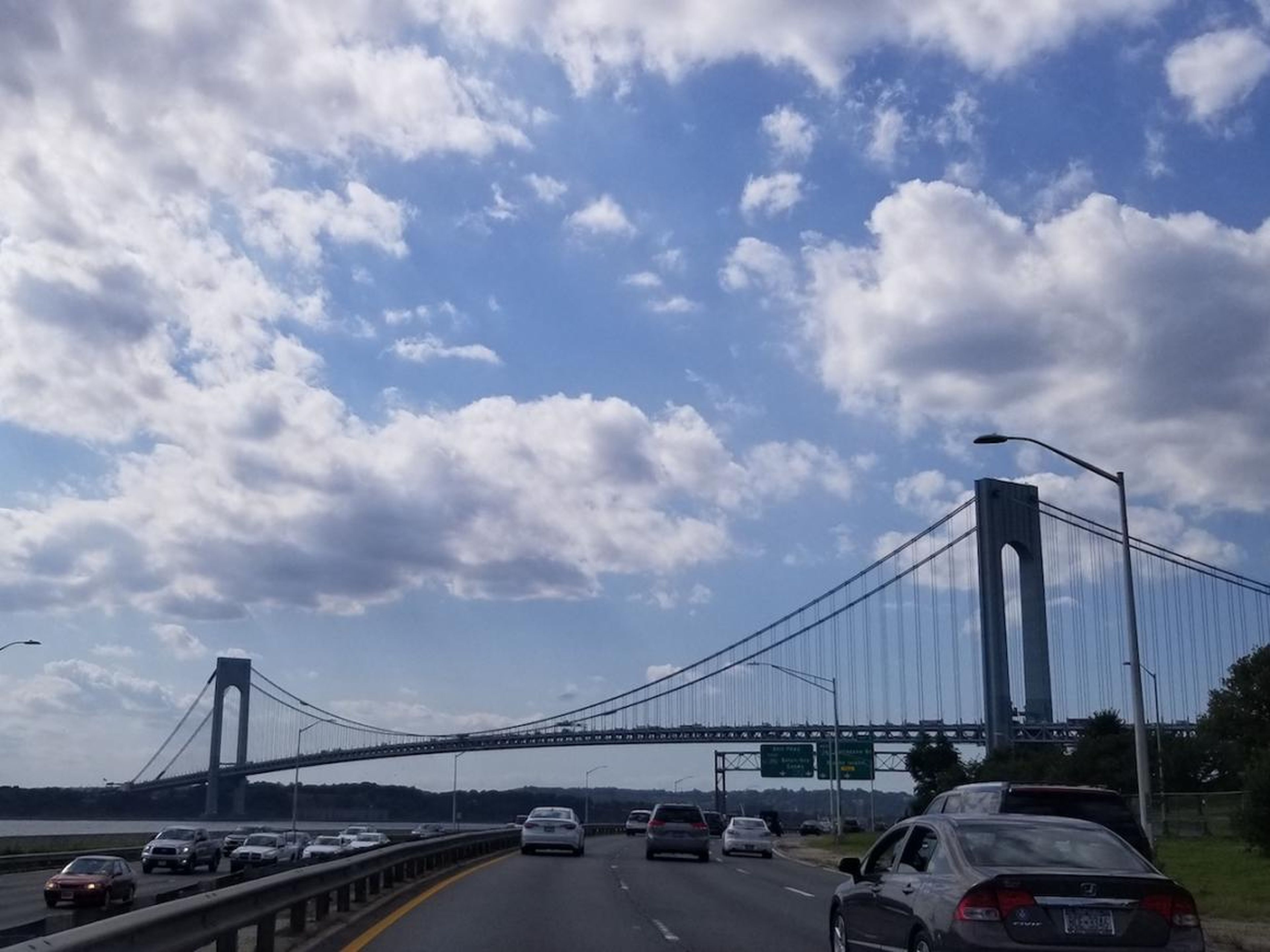 At 2:15 p.m., Sabatier and Robin tire of walking and drive into Manhattan. They take the long route to soak up the water views.