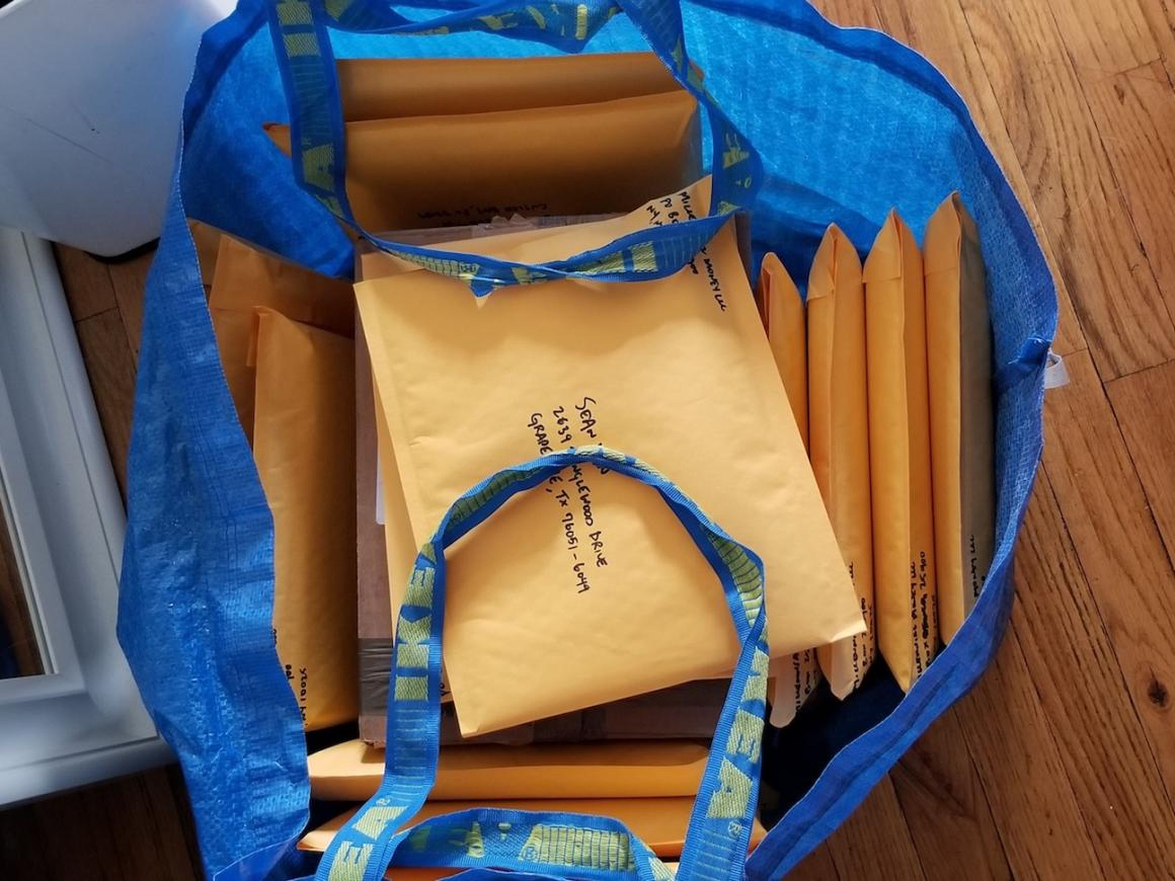 Around 9 a.m., Sabatier heads to the local post office to mail signed copies of his book. He typically ships out about 40 copies every week when he's home. By now, he's used to carting books around — Ikea bags work best, he said.
