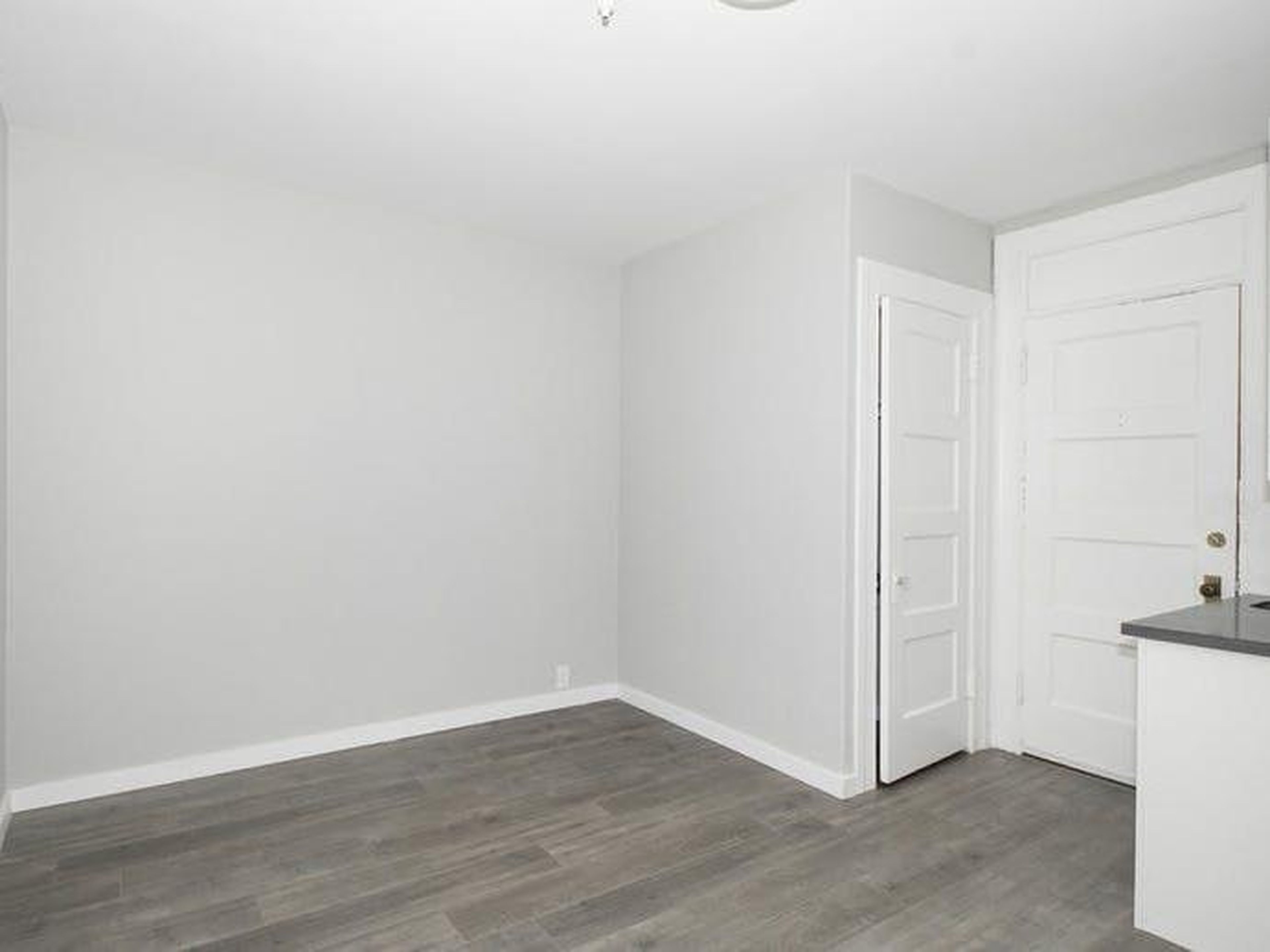 Beyond that, the studio has one window and a space heater. According to the listing, the unit comes with a dishwasher and in-unit laundry, but we couldn't find them in the listing photos — or, frankly, imagine where they could